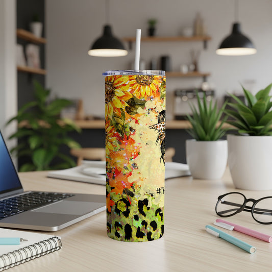 Sunflower and leopard print tumbler with messy bun design.