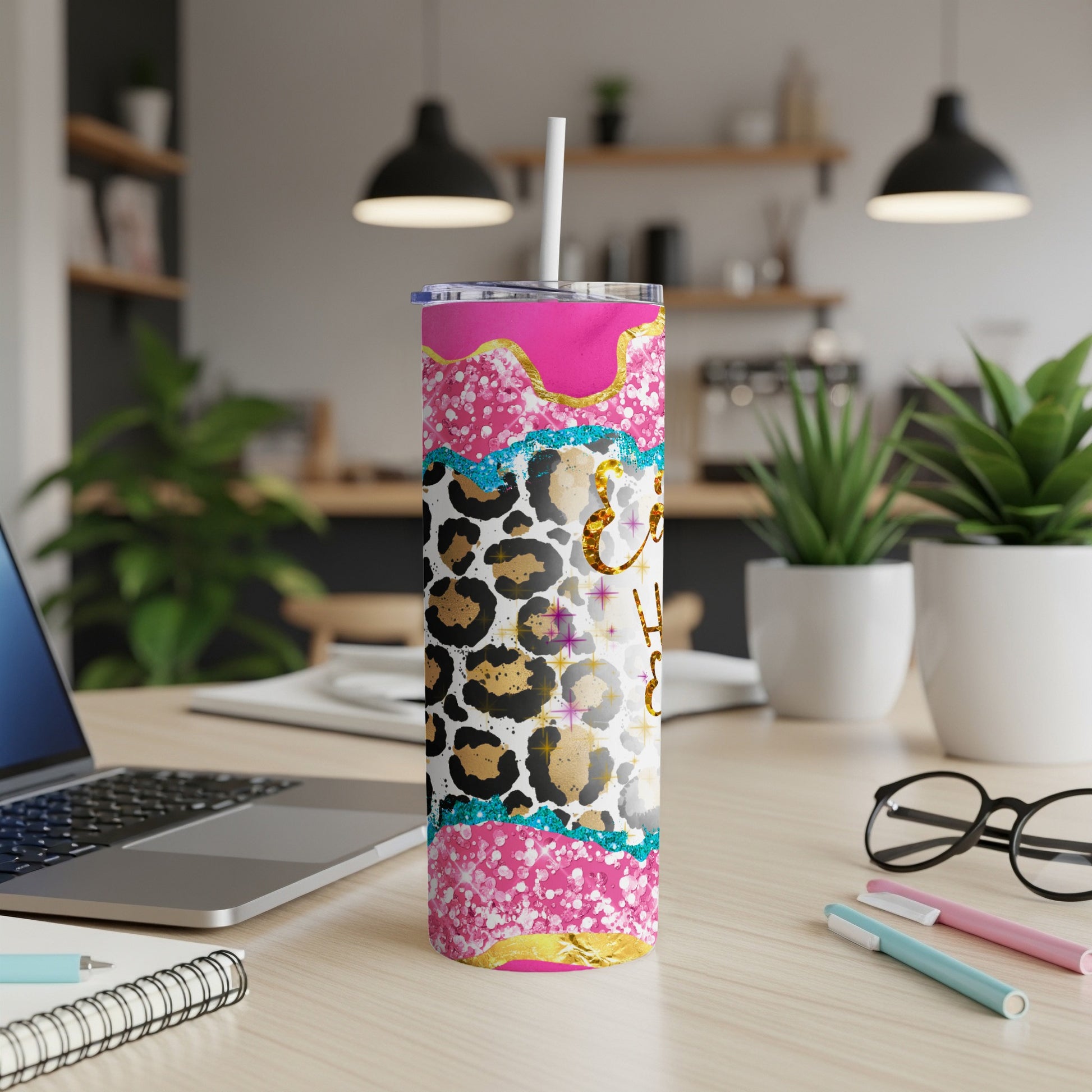 Hot pink tumbler with leopard print and glitter details.