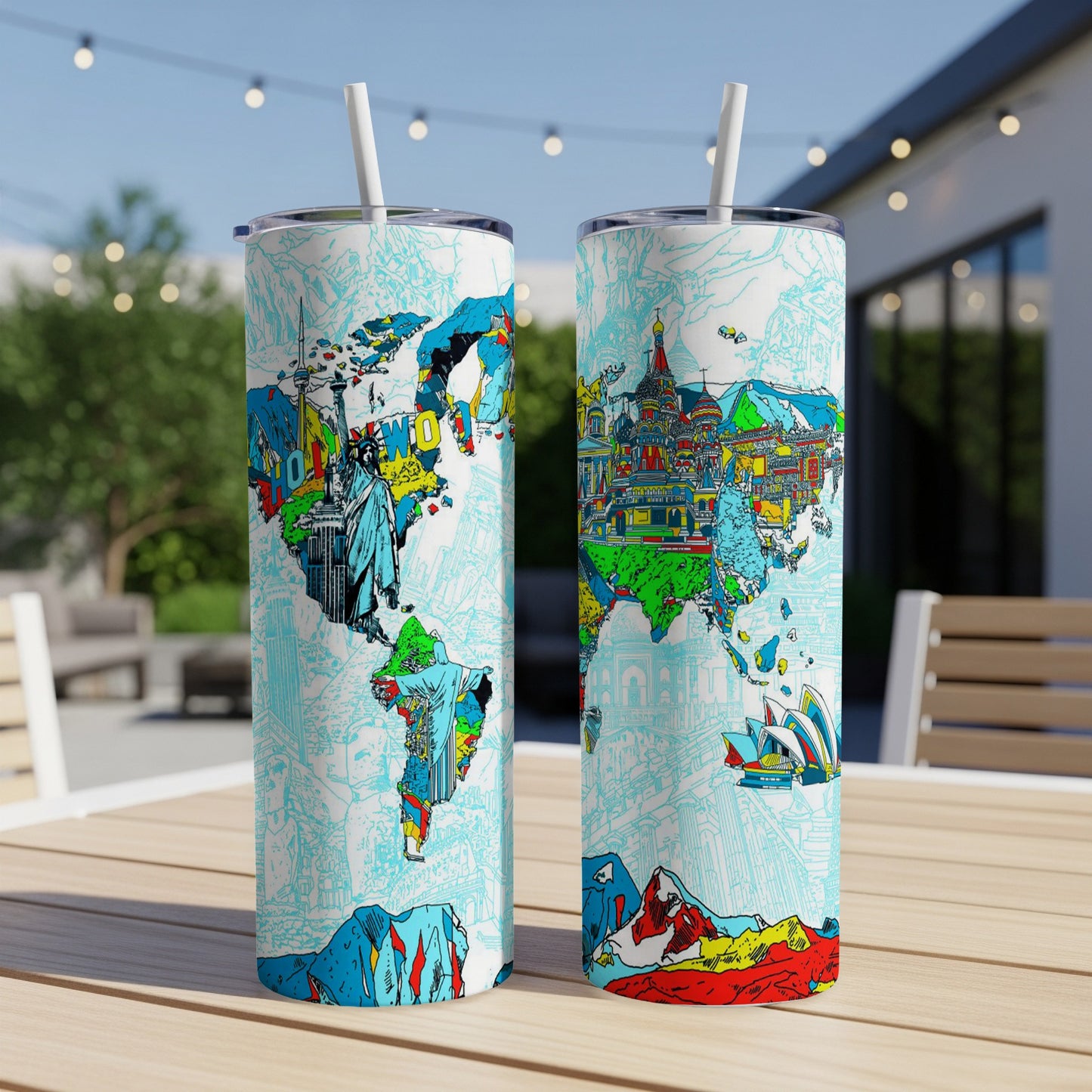Two tumblers featuring a world map with iconic landmarks, placed on a wooden table outdoors.