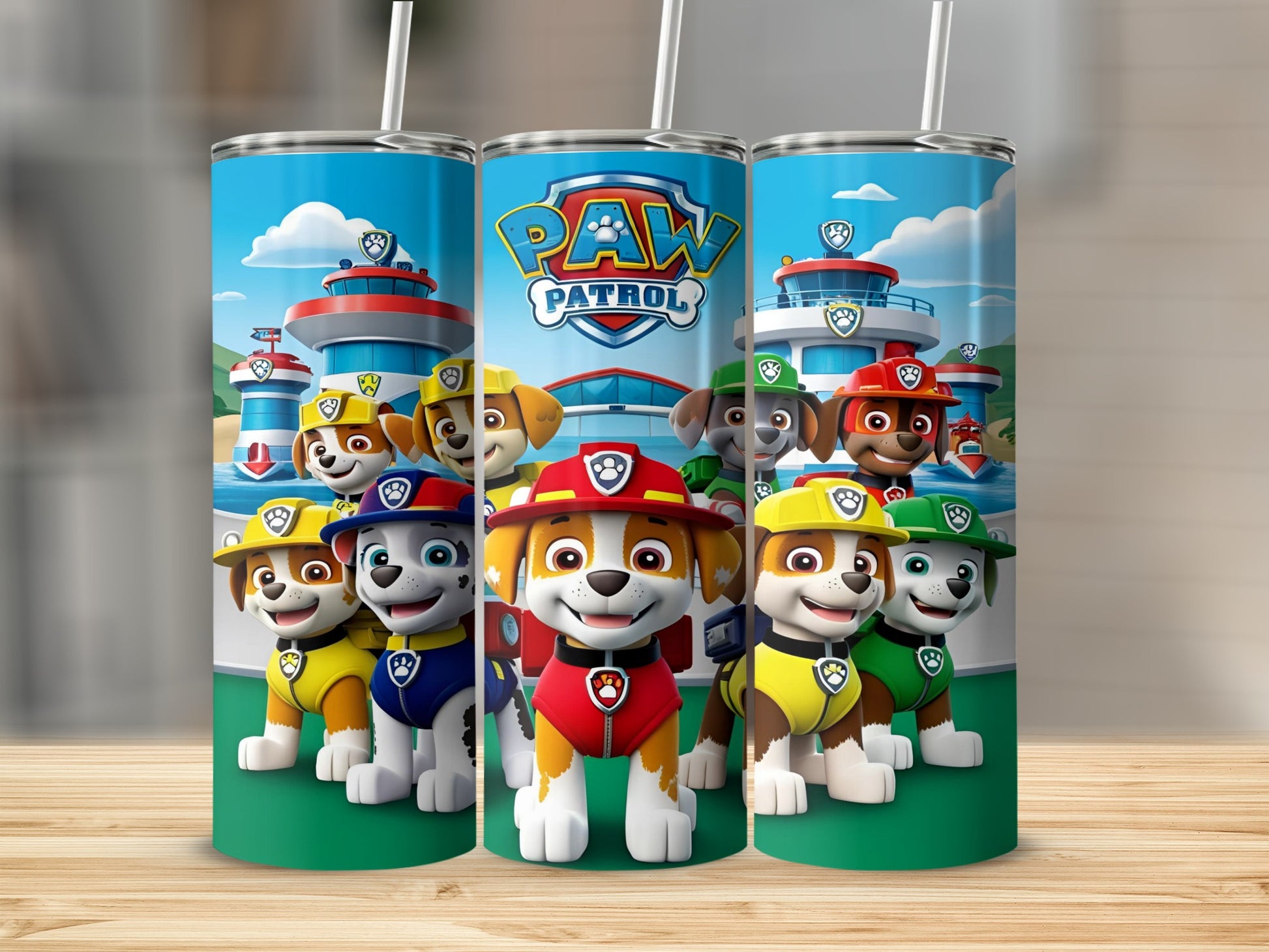 Paw Patrol characters with buildings in the background on three tumblers.