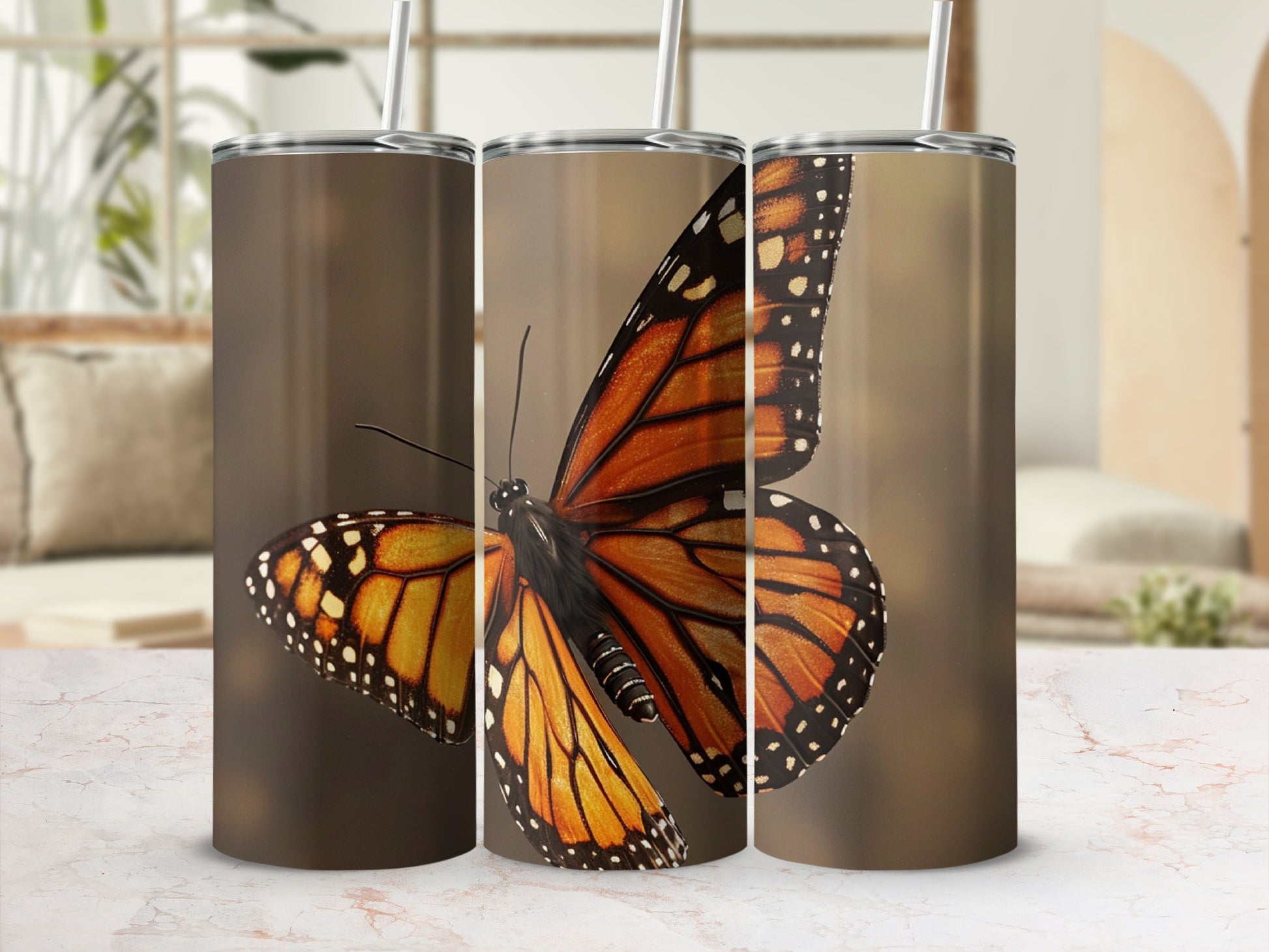 Monarch butterfly on a tumbler with a blurred background.