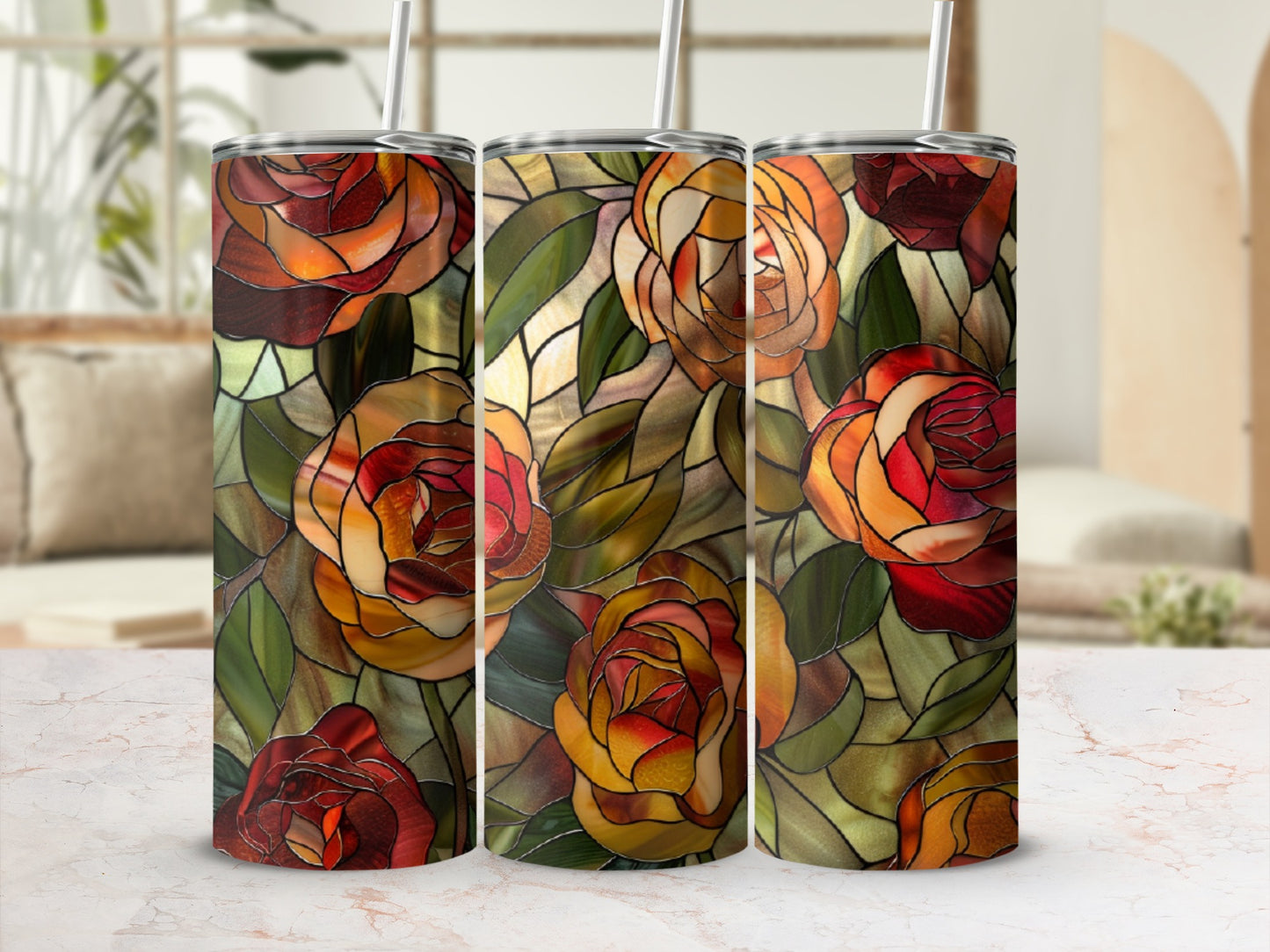 Three tumblers with stained glass rose pattern and reusable straws.