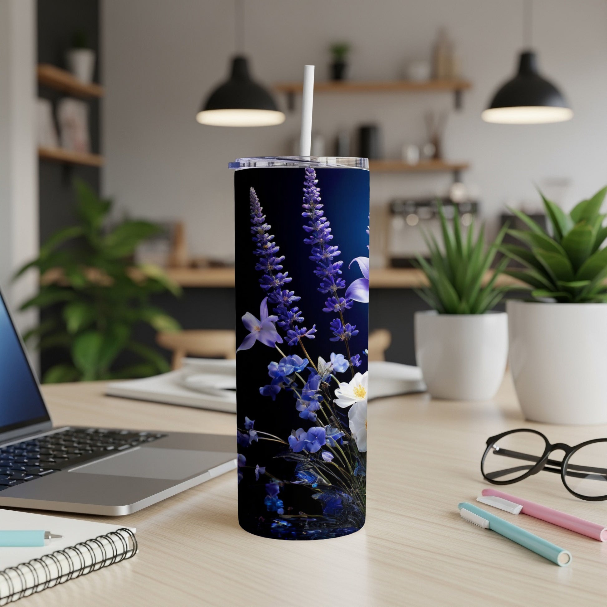 Floral skinny tumbler with lavender and white flowers on a dark blue background.