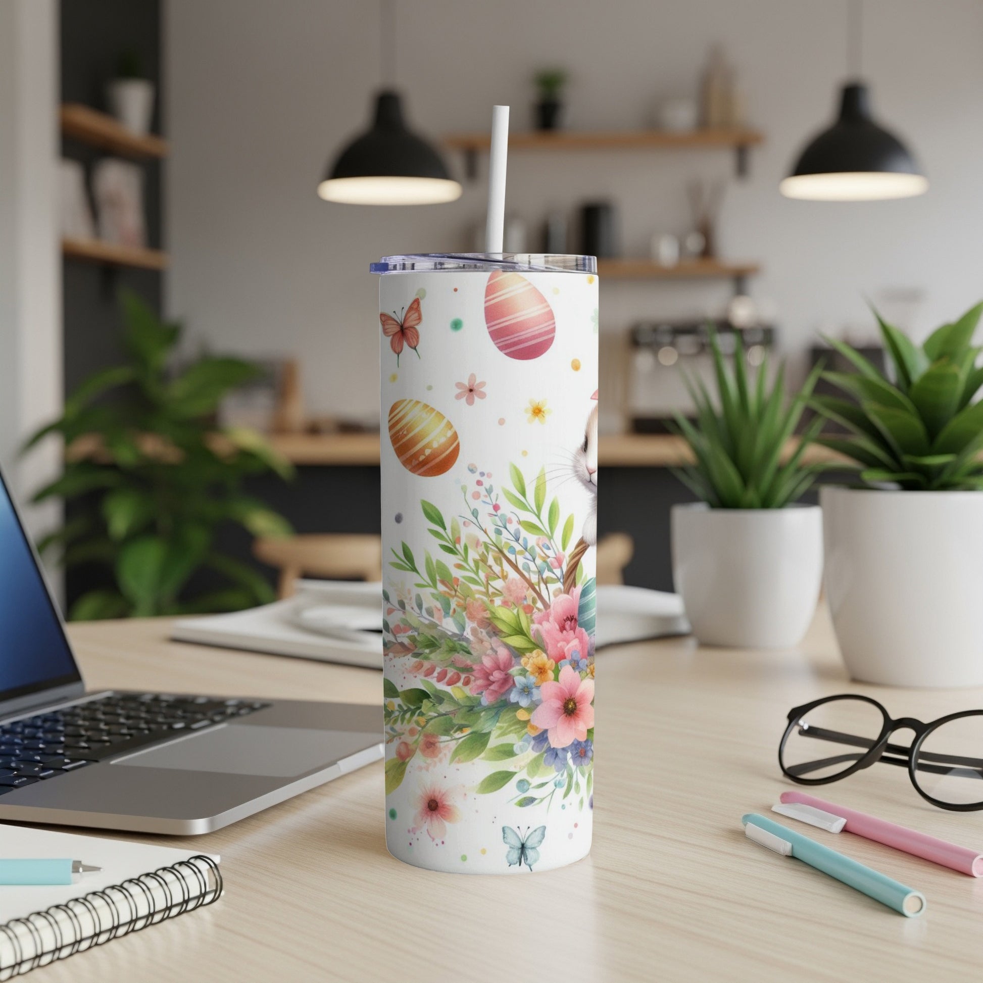 Easter bunny and floral pattern on a white tumbler with straw.