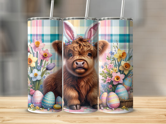 Highland cow with bunny ears surrounded by Easter eggs and flowers.
