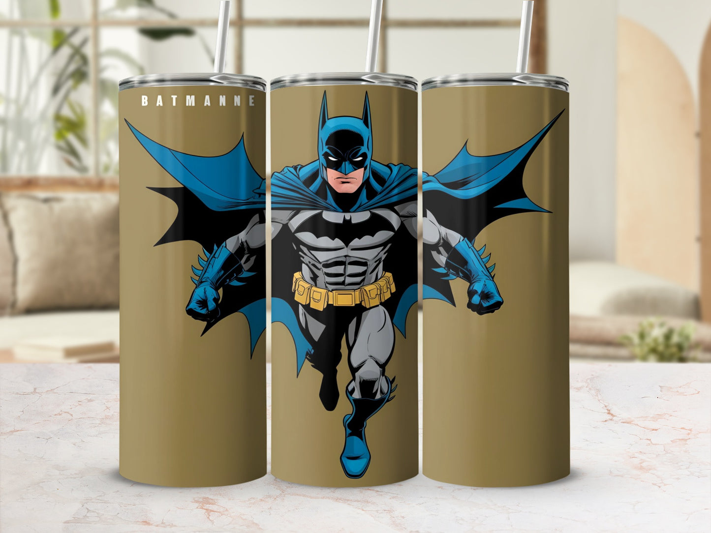 Batman in action on a gold tumbler with "BATMAN" text.