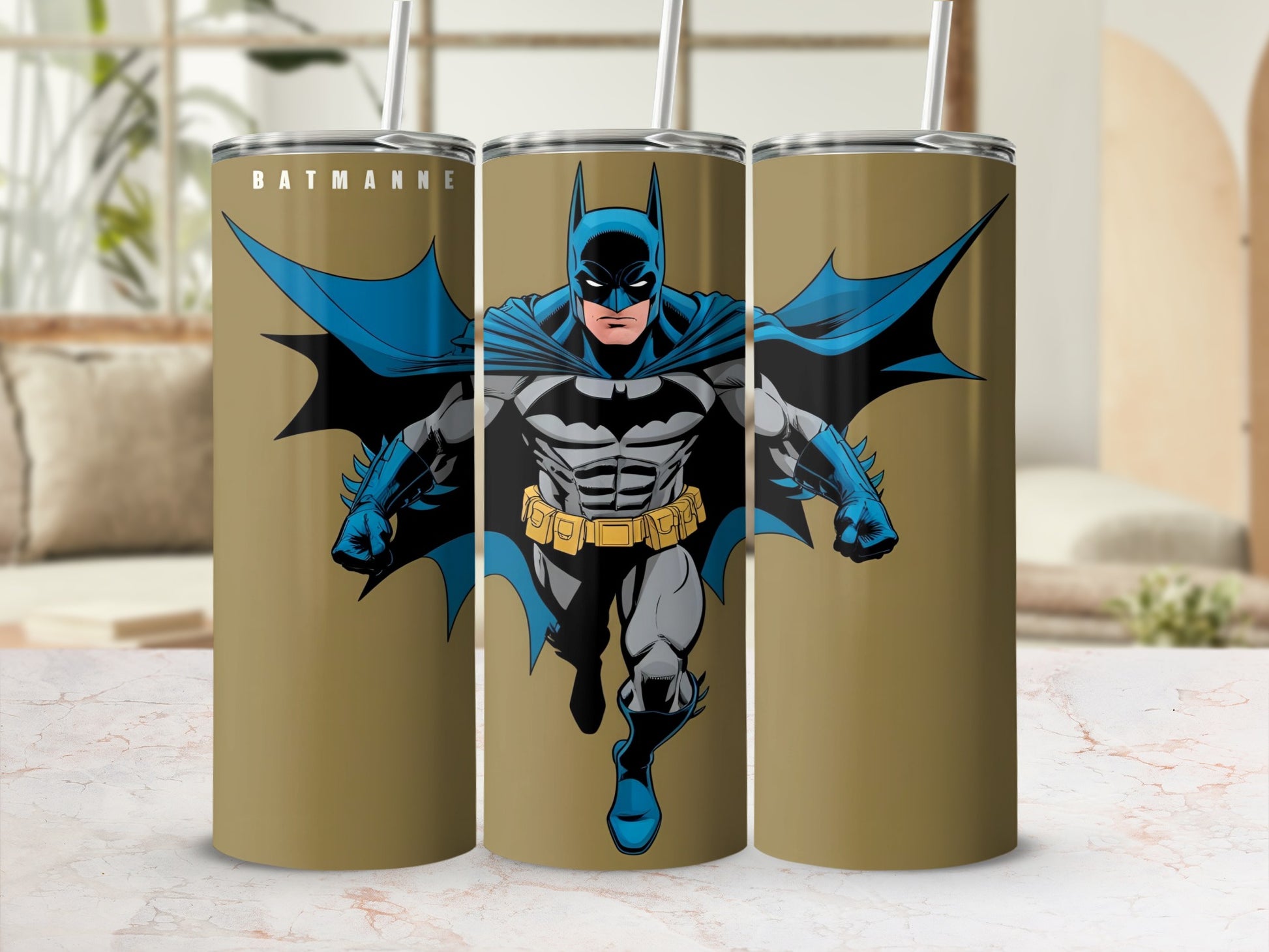 Batman in action on a gold tumbler with "BATMAN" text.