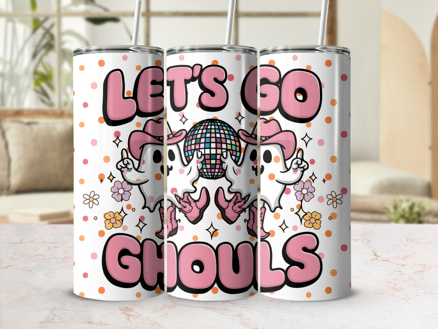 "Let's Go Ghouls" text on a tumbler with cartoon ghosts, disco ball, and polka dots.