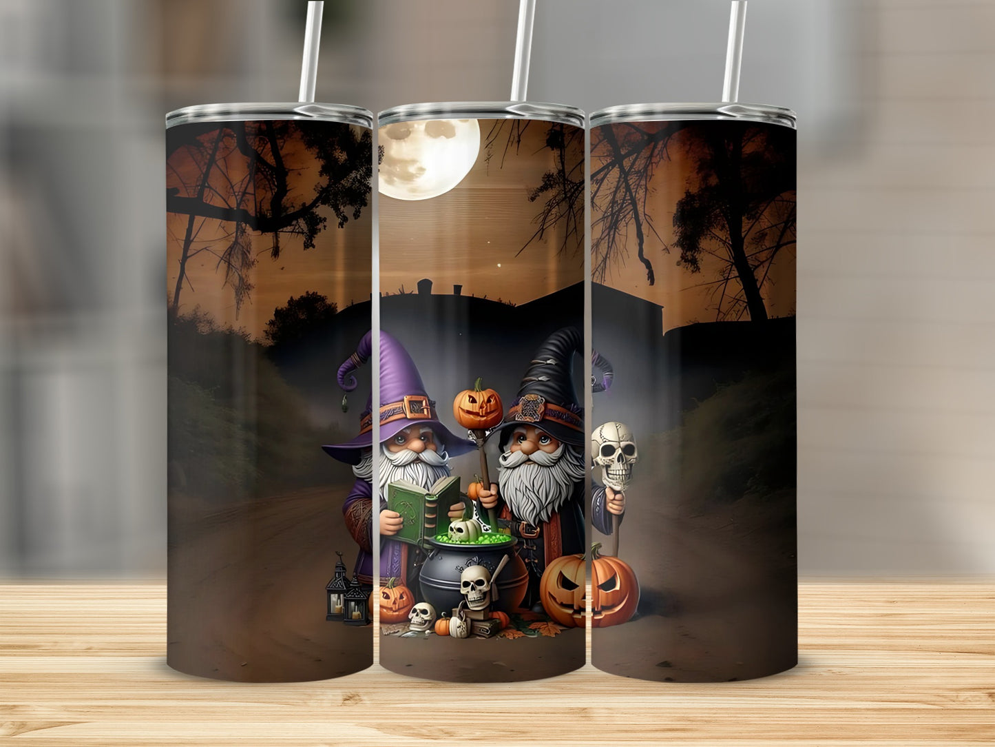 Halloween tumblers with gnomes, pumpkins, skulls, and a spooky nighttime scene.
