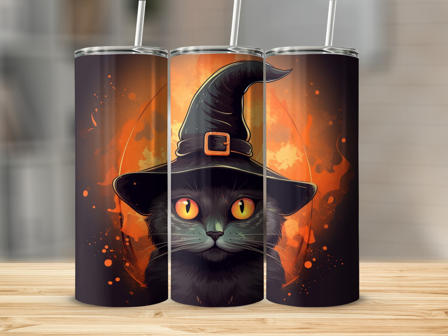 Black cat wearing a witch hat on tumblers with orange splatter design.