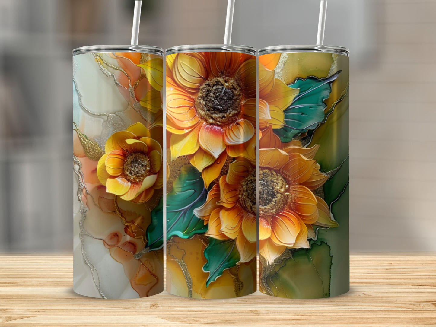 Three tumblers with a textured sunflower design on an abstract background.