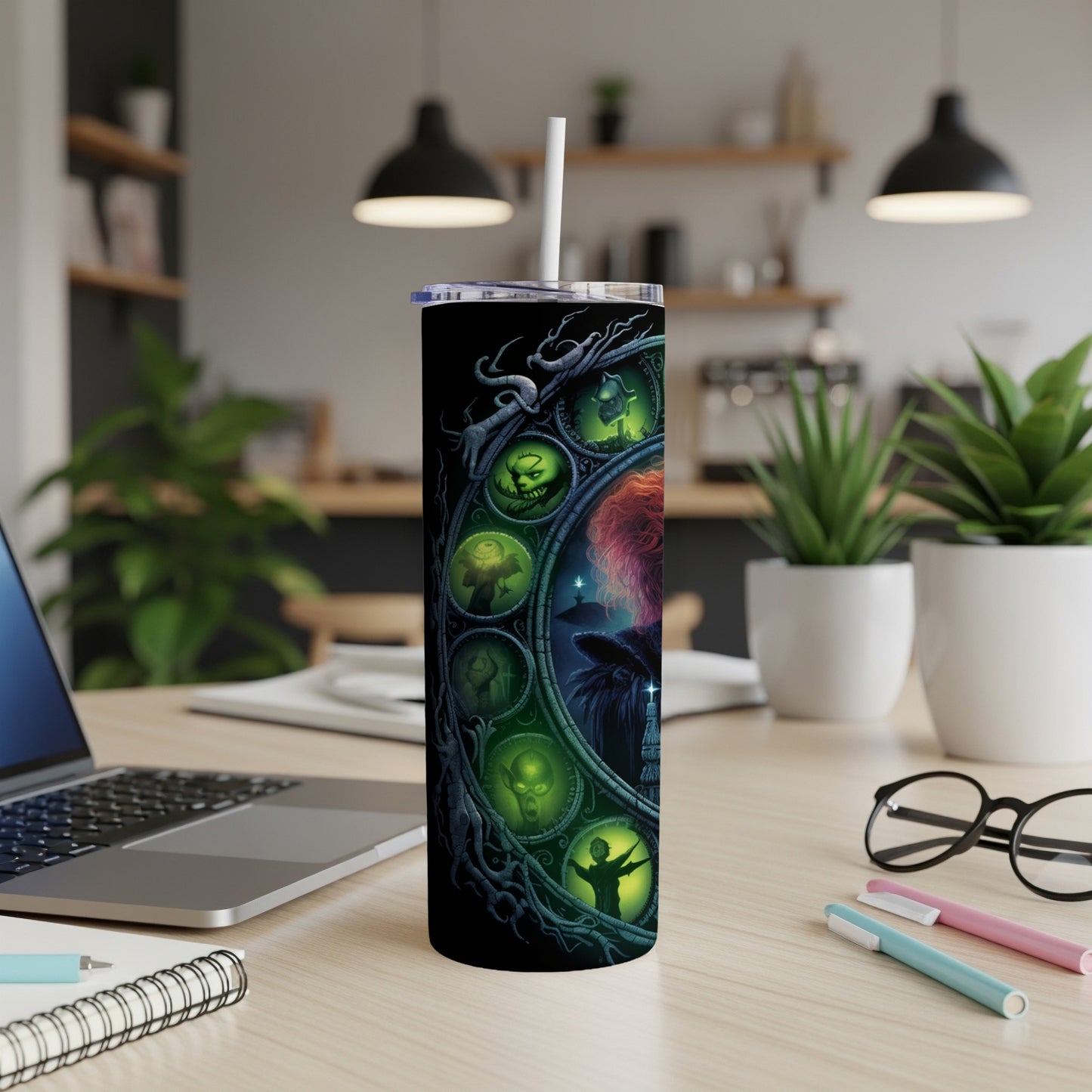 Black tumbler with circular spooky themed illustrations including witches and creatures.