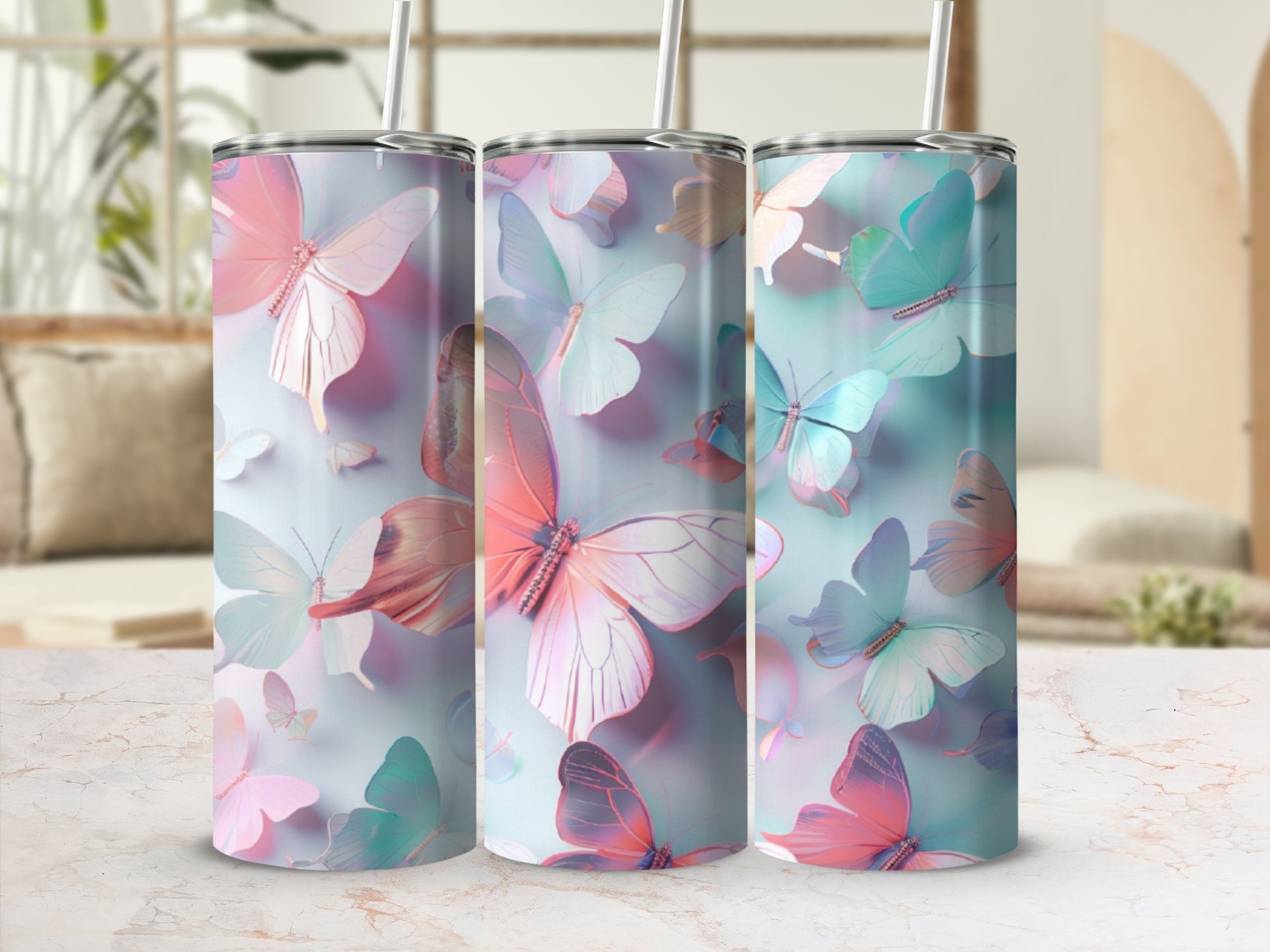 Three tumblers with a pastel butterfly pattern.
