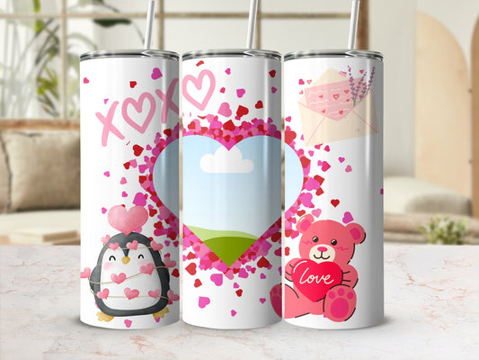 Three Valentine's themed tumblers with a penguin, teddy bear, and hearts design.