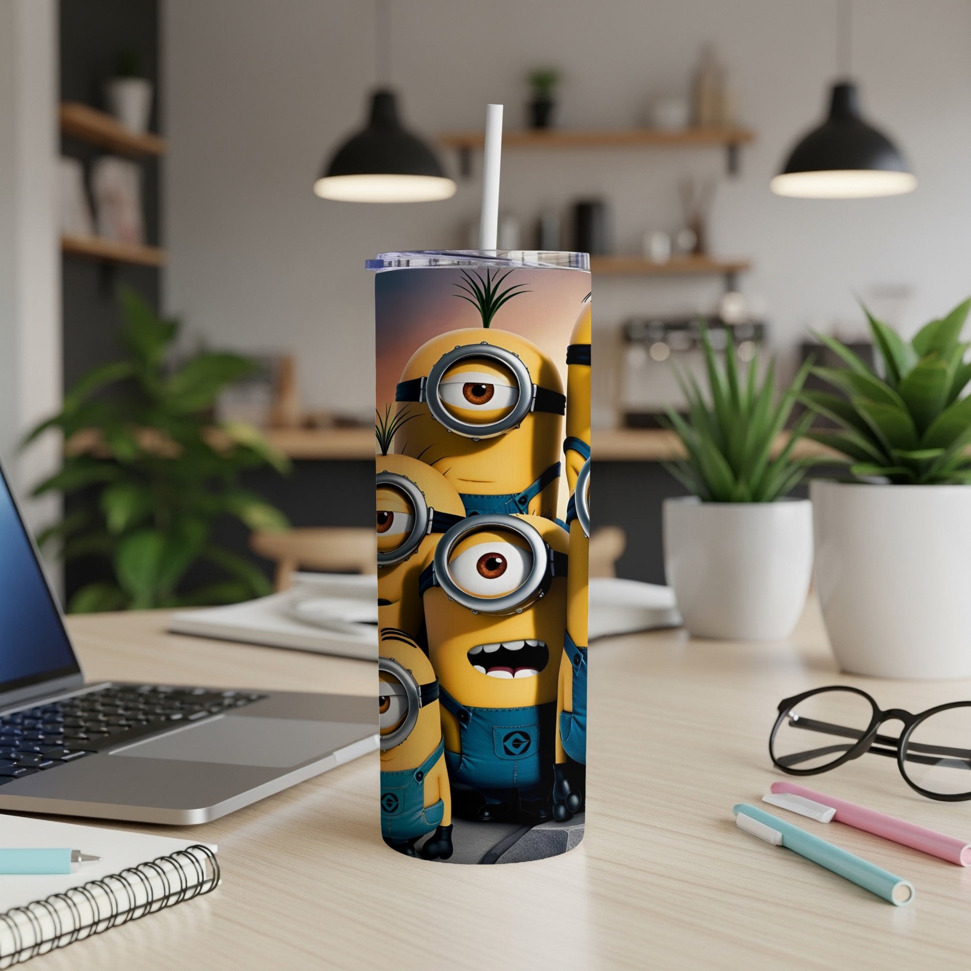 Minions cartoon characters on a white tumbler with a straw.