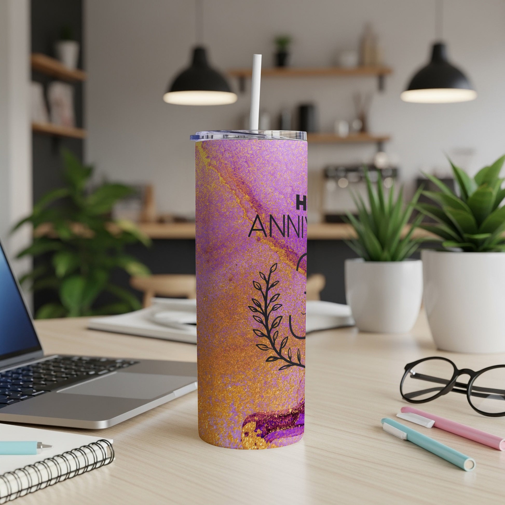 Purple and gold marbled tumbler with "Happy Anniversary" text.