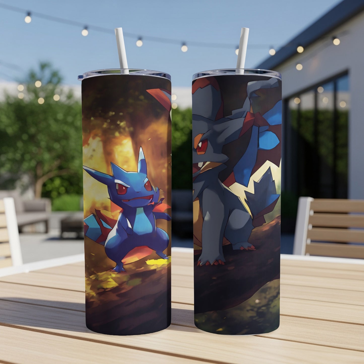 Two tumblers featuring Pokémon characters, one blue and one dark gray.