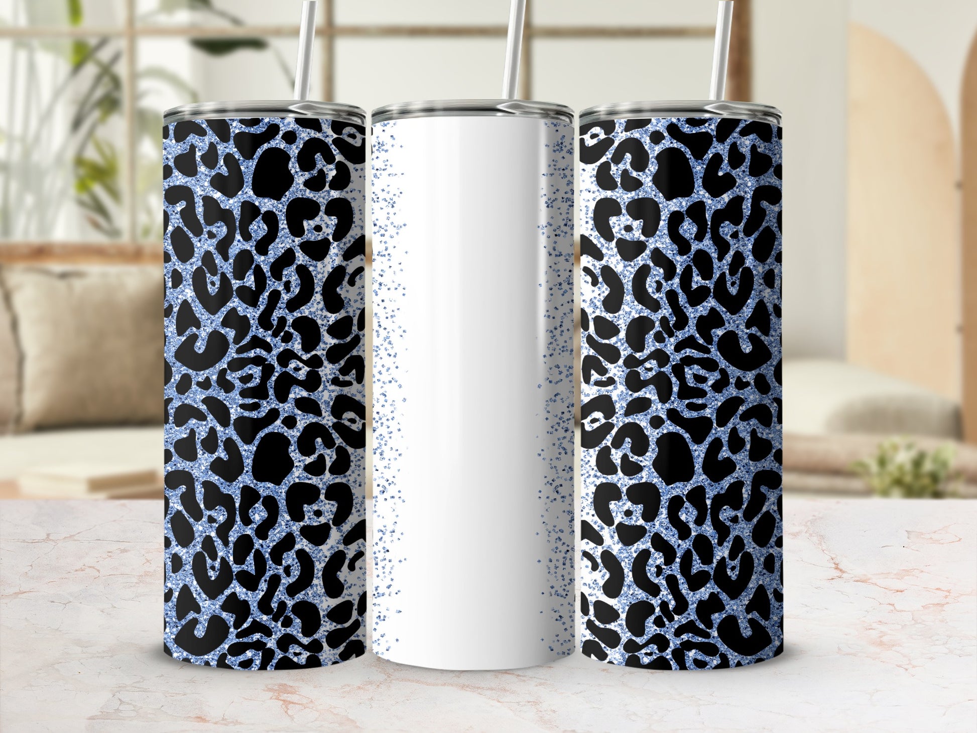 White and blue glitter leopard print skinny tumblers with straws.