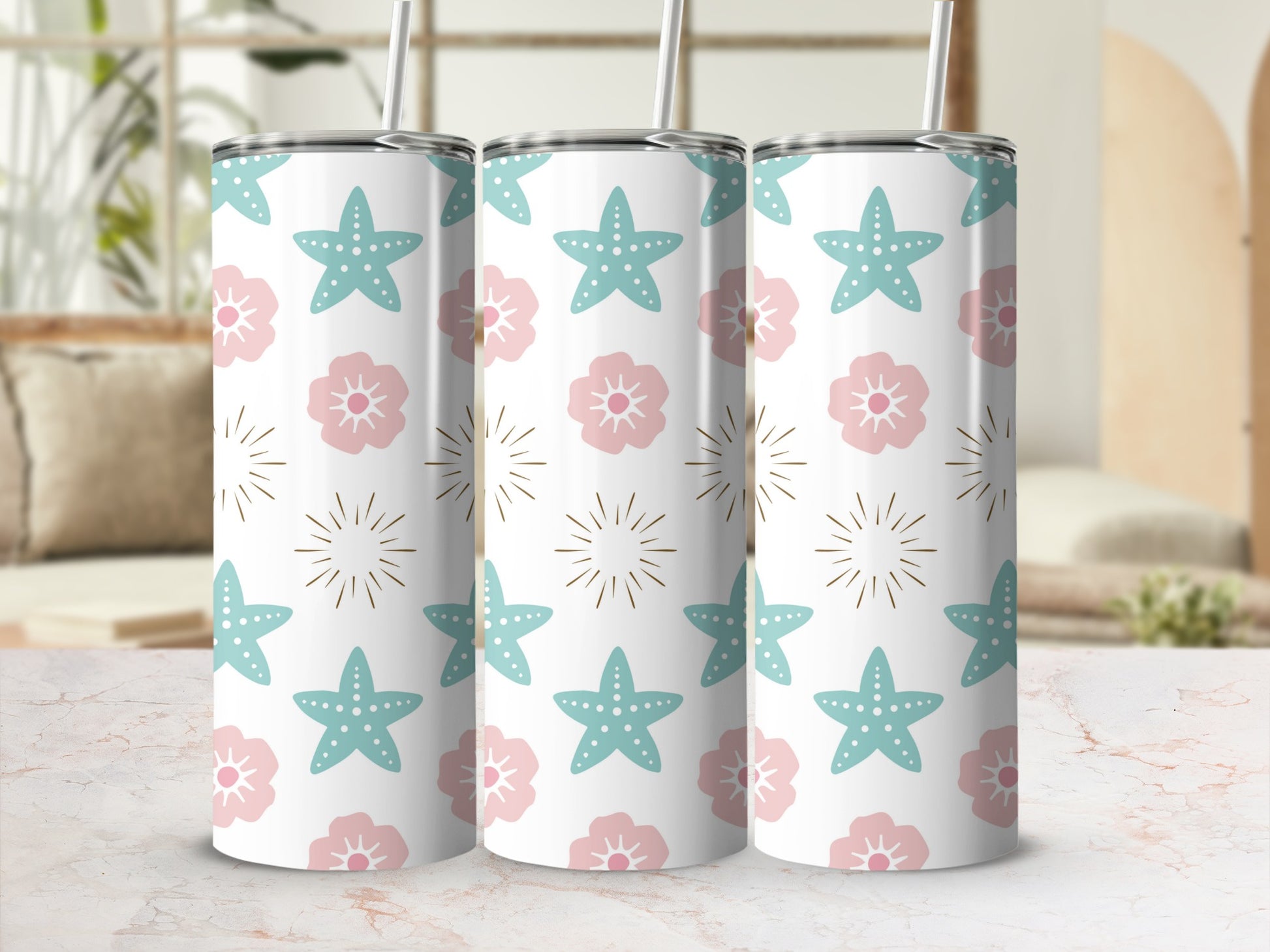 White tumbler with repeating starfish and flower pattern.