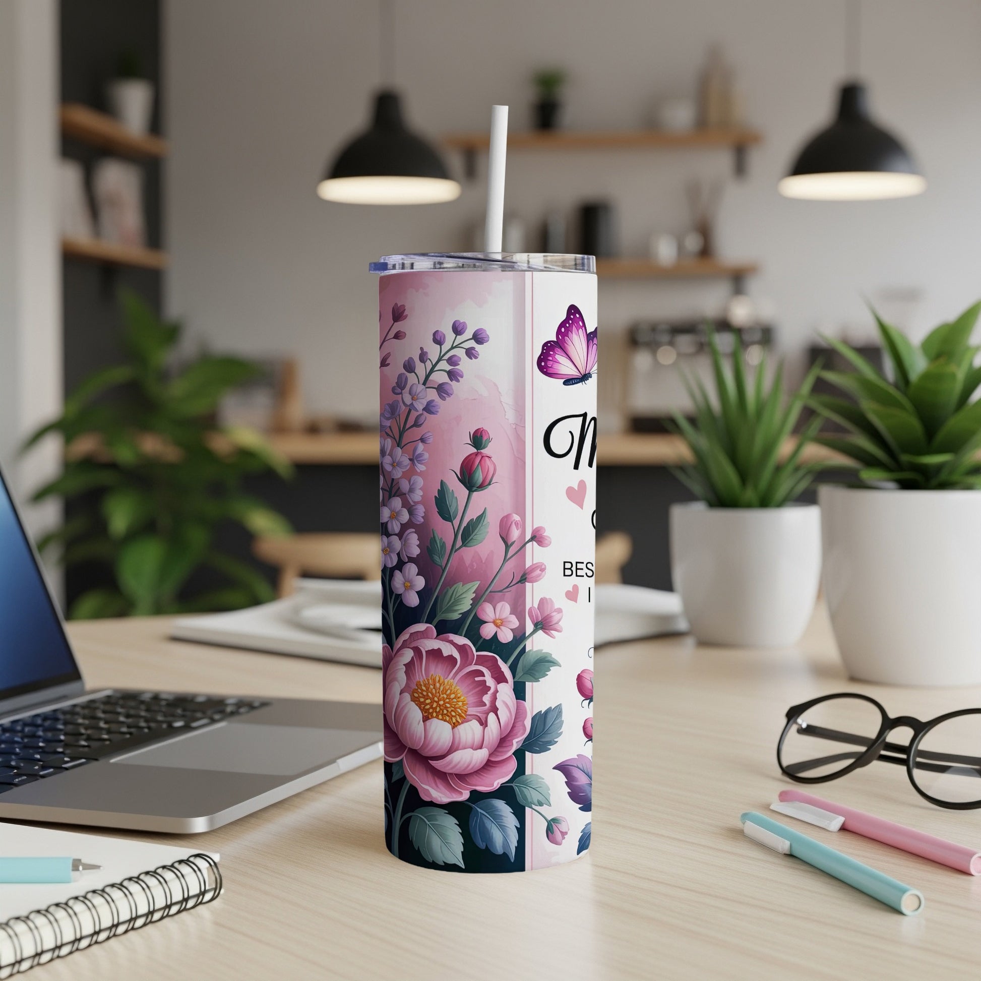 Pink floral tumbler with "Best Mom Ever" text and butterfly.