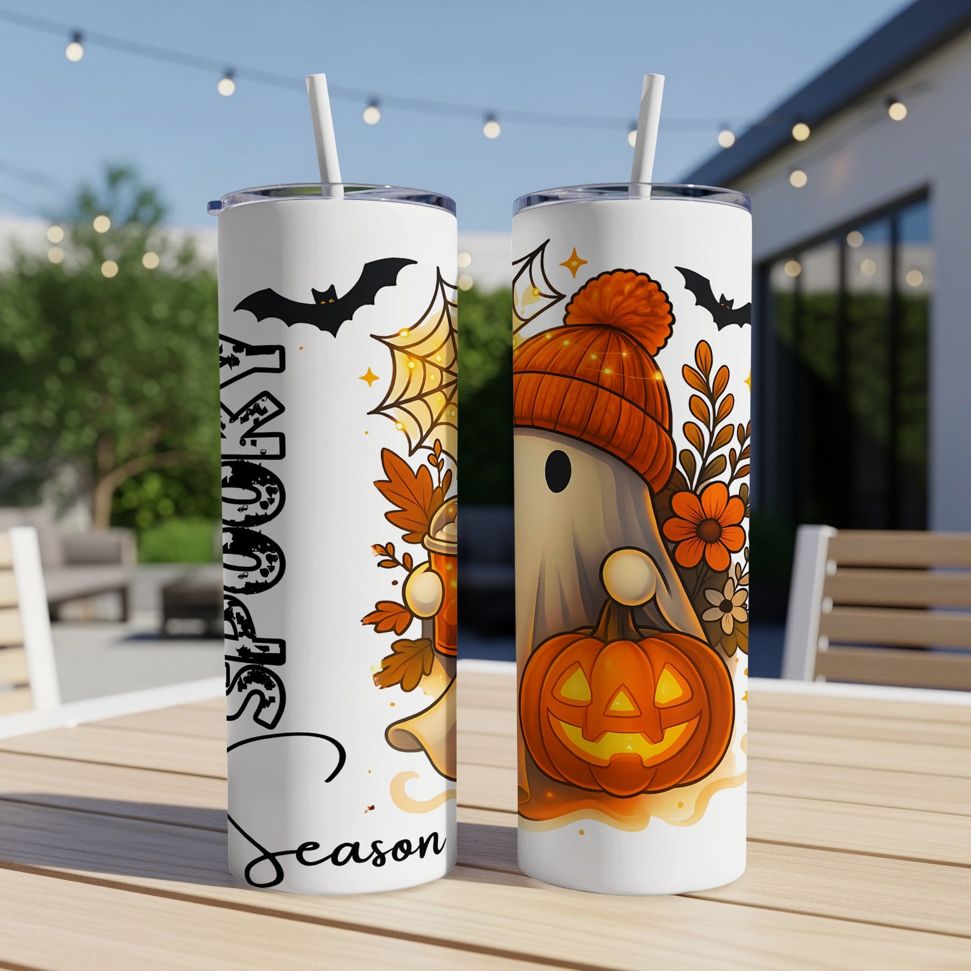 White tumblers with spooky ghost, pumpkin, bats, and "Spooky Season" text.
