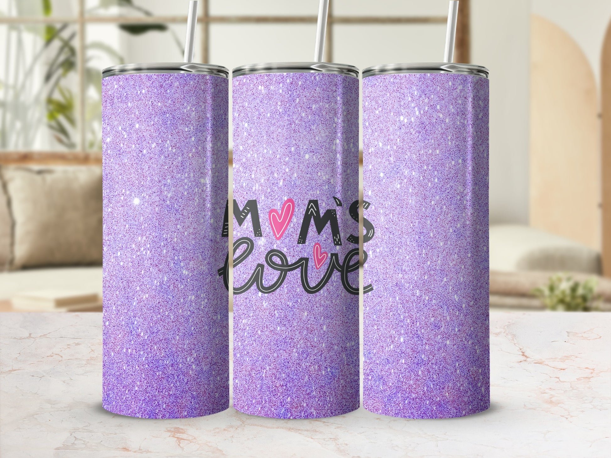 Purple glitter tumbler with "Mom's Love" text and heart designs.