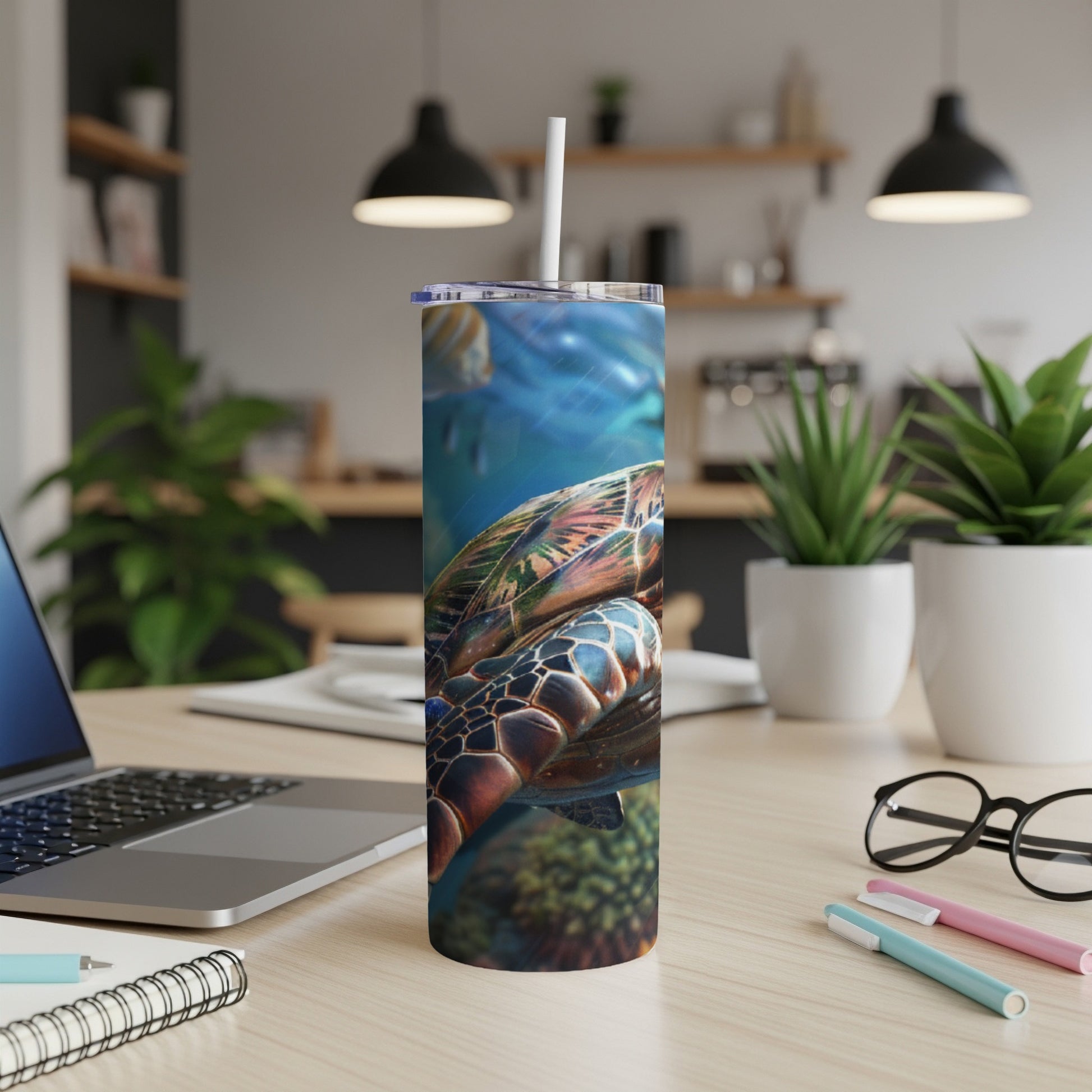 Sea turtle swimming underwater, printed on a white tumbler with straw.