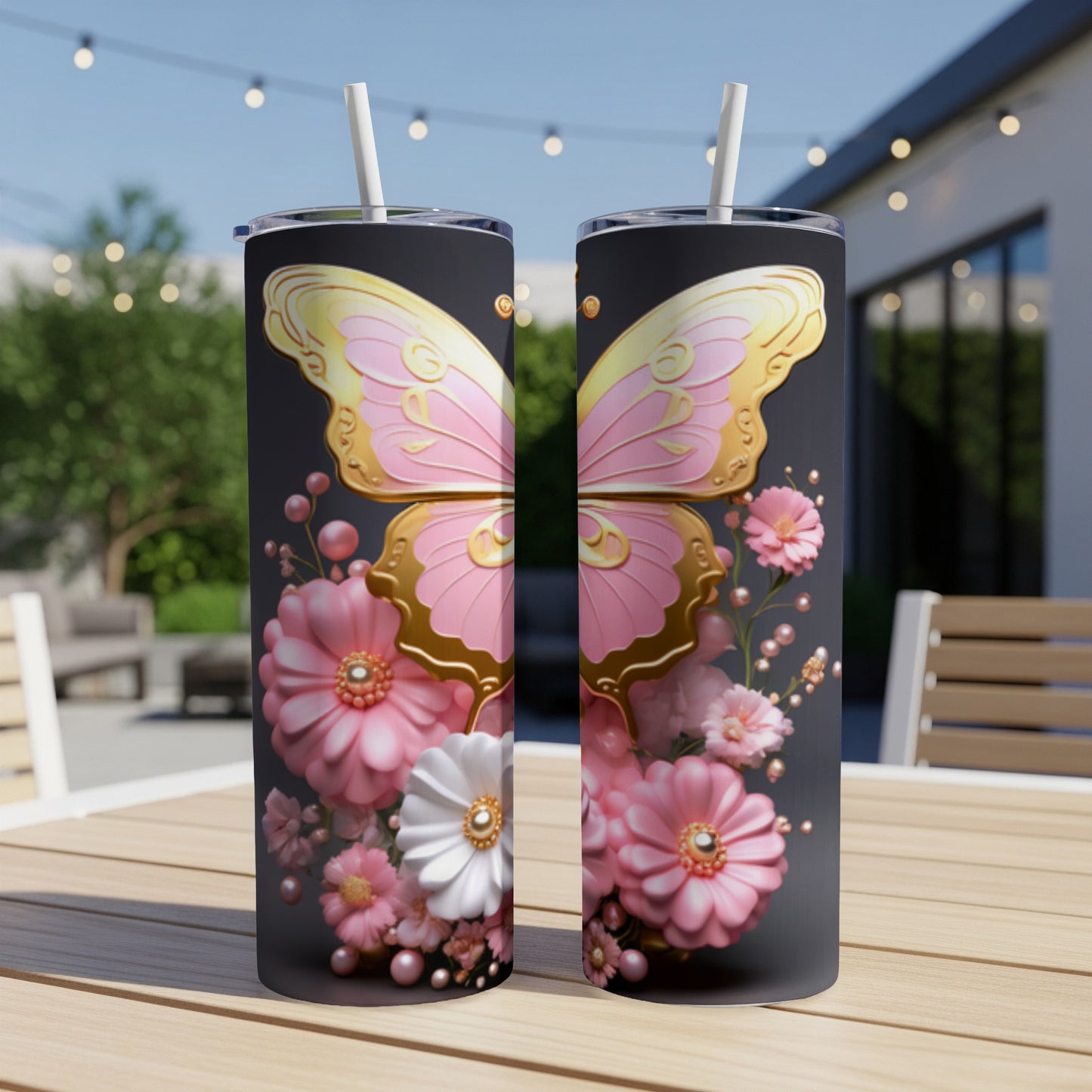 Two tumblers with a pink and gold butterfly and floral design.