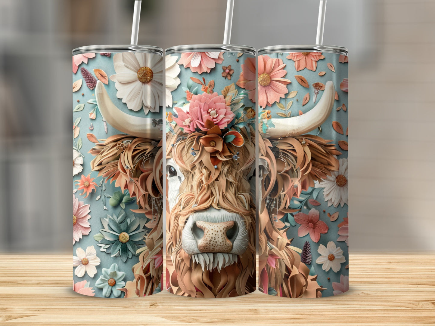 Highland cow with floral crown on pale blue background, three tumblers.