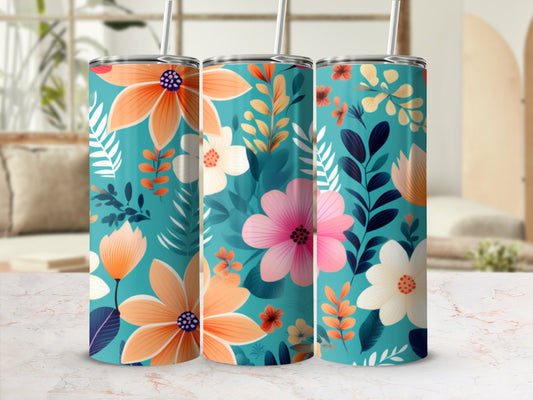 Three teal tumblers with colorful floral and leaf patterns.