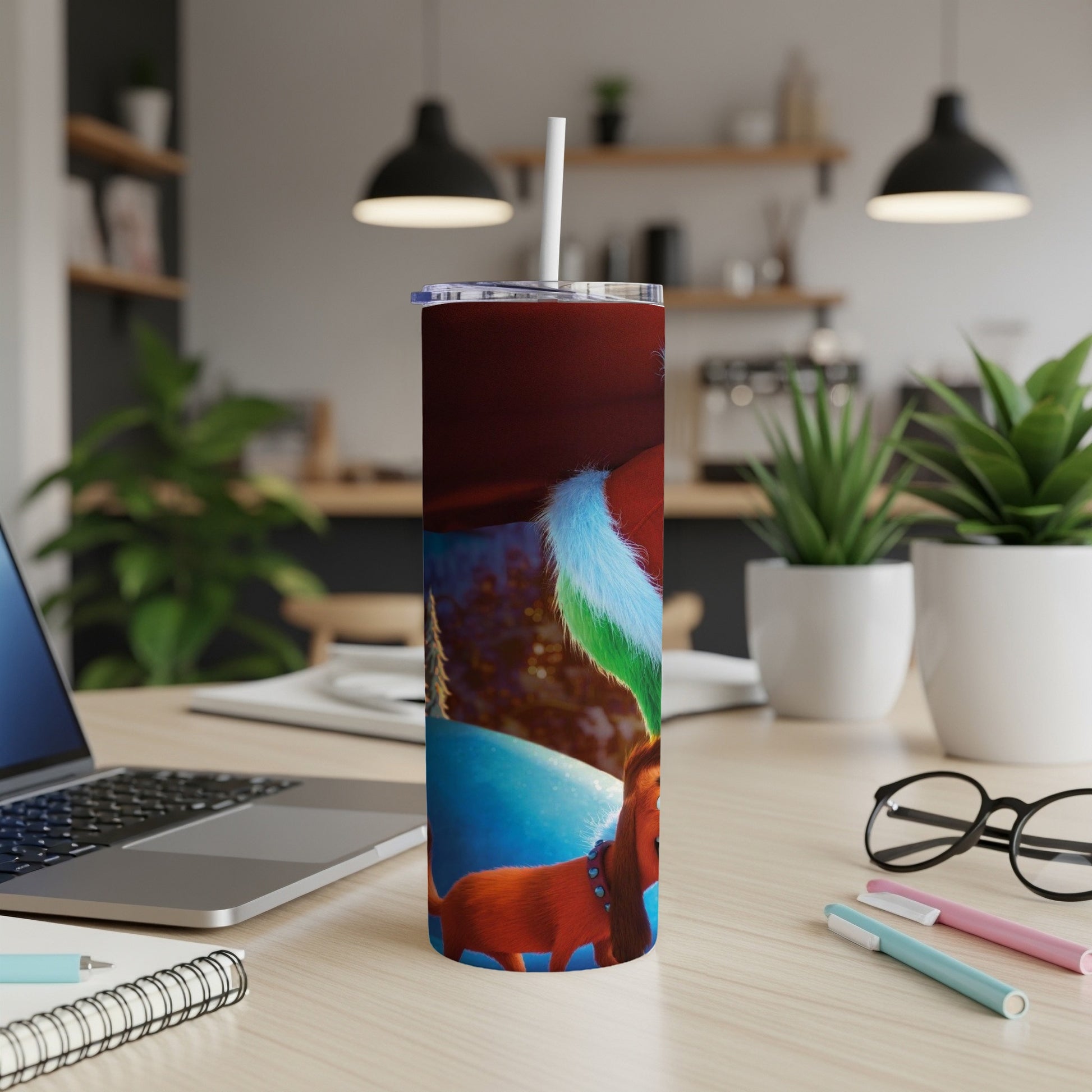 Brown dog wearing Santa hat, on a skinny tumbler with straw.