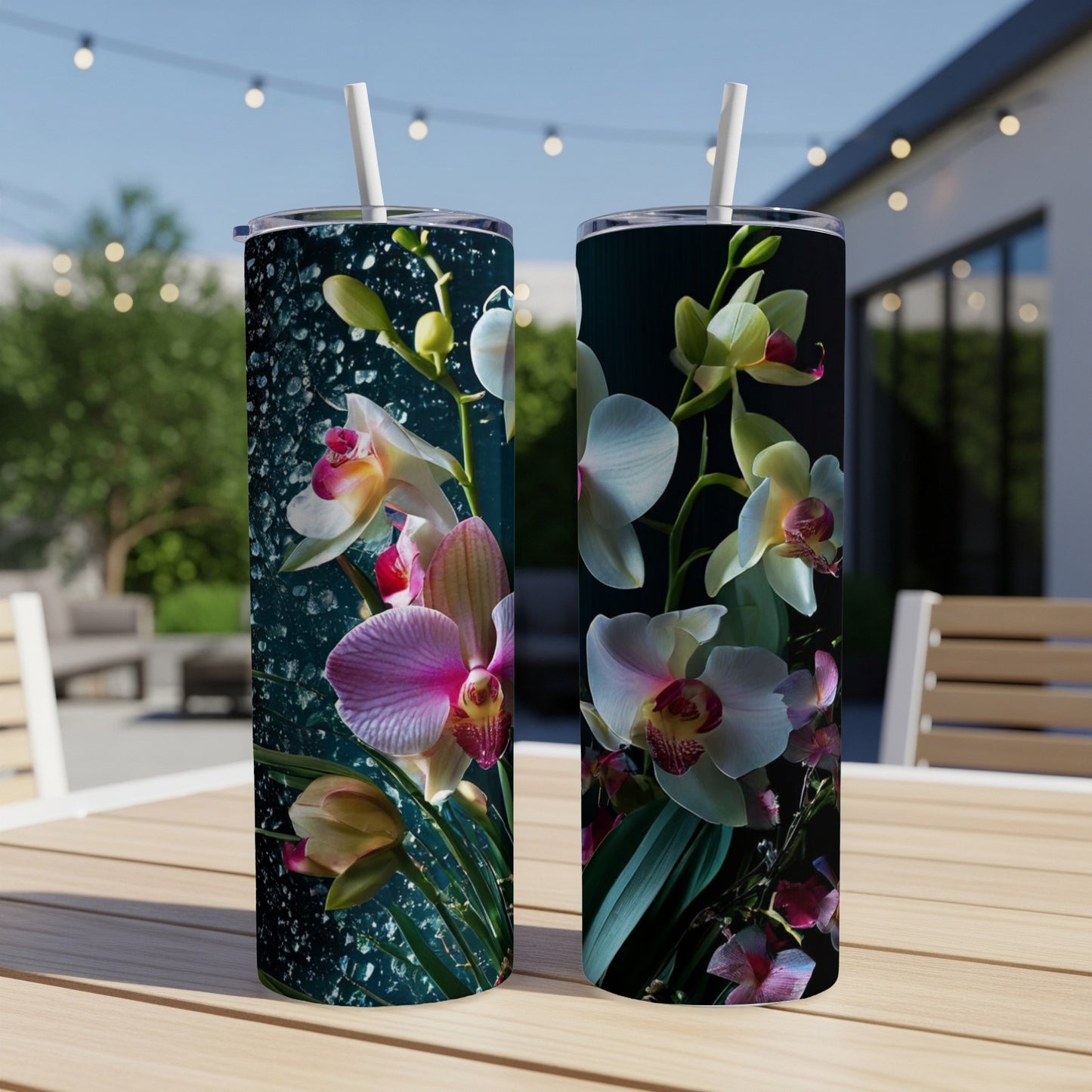 Two floral tumblers with pink, white, and yellow orchids and greenery.