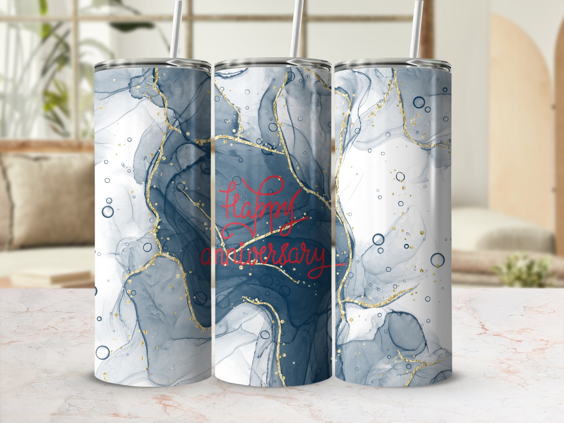 Tumbler with abstract blue and gold design, "Happy Anniversary" text.
