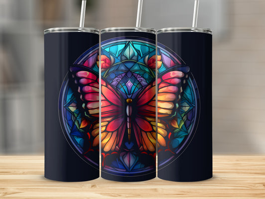 Stained glass butterfly design on a dark navy tumbler.