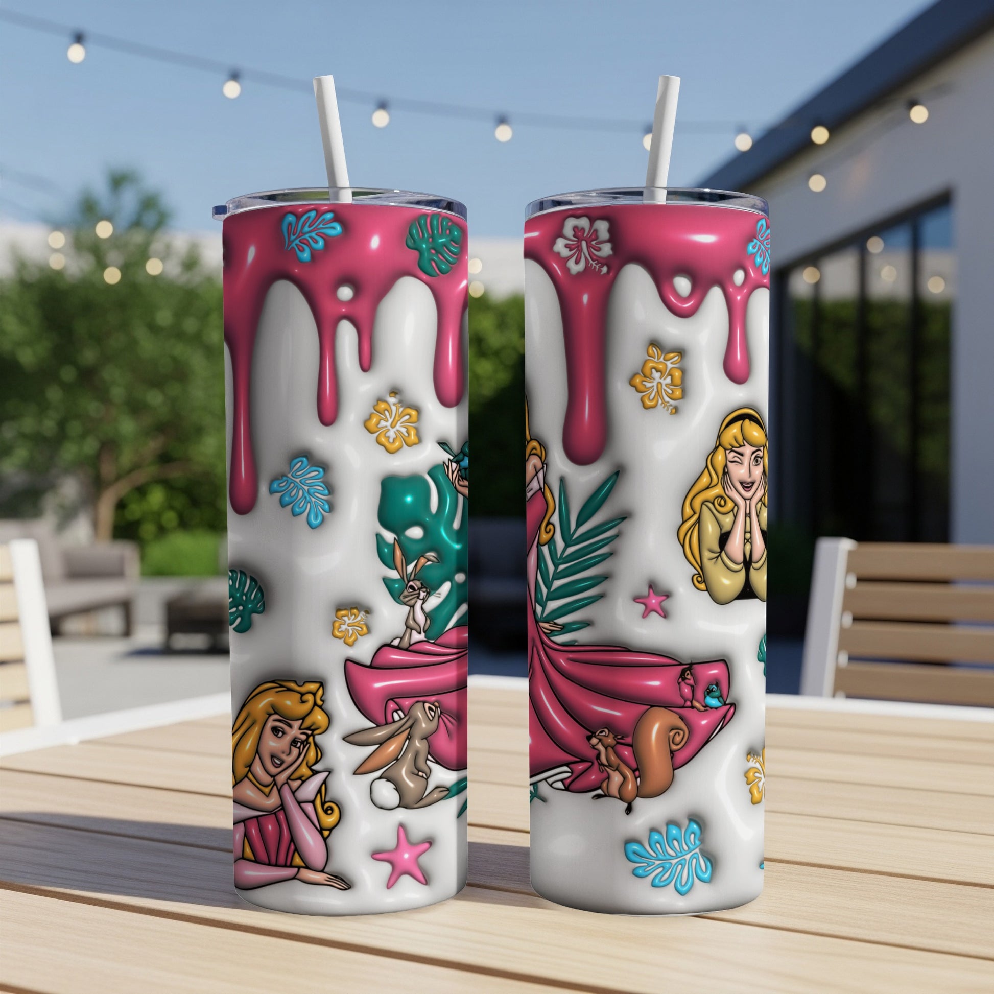 Aurora and woodland creatures on a pink-drip decorated white tumbler.