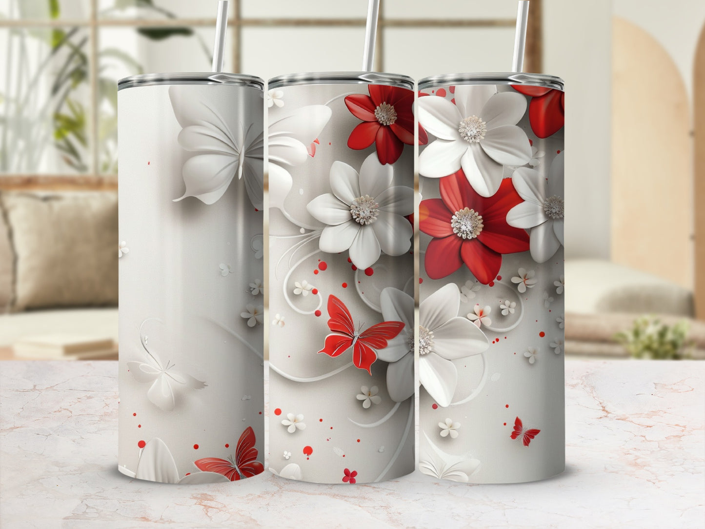 Three white and red floral tumblers with butterfly accents.