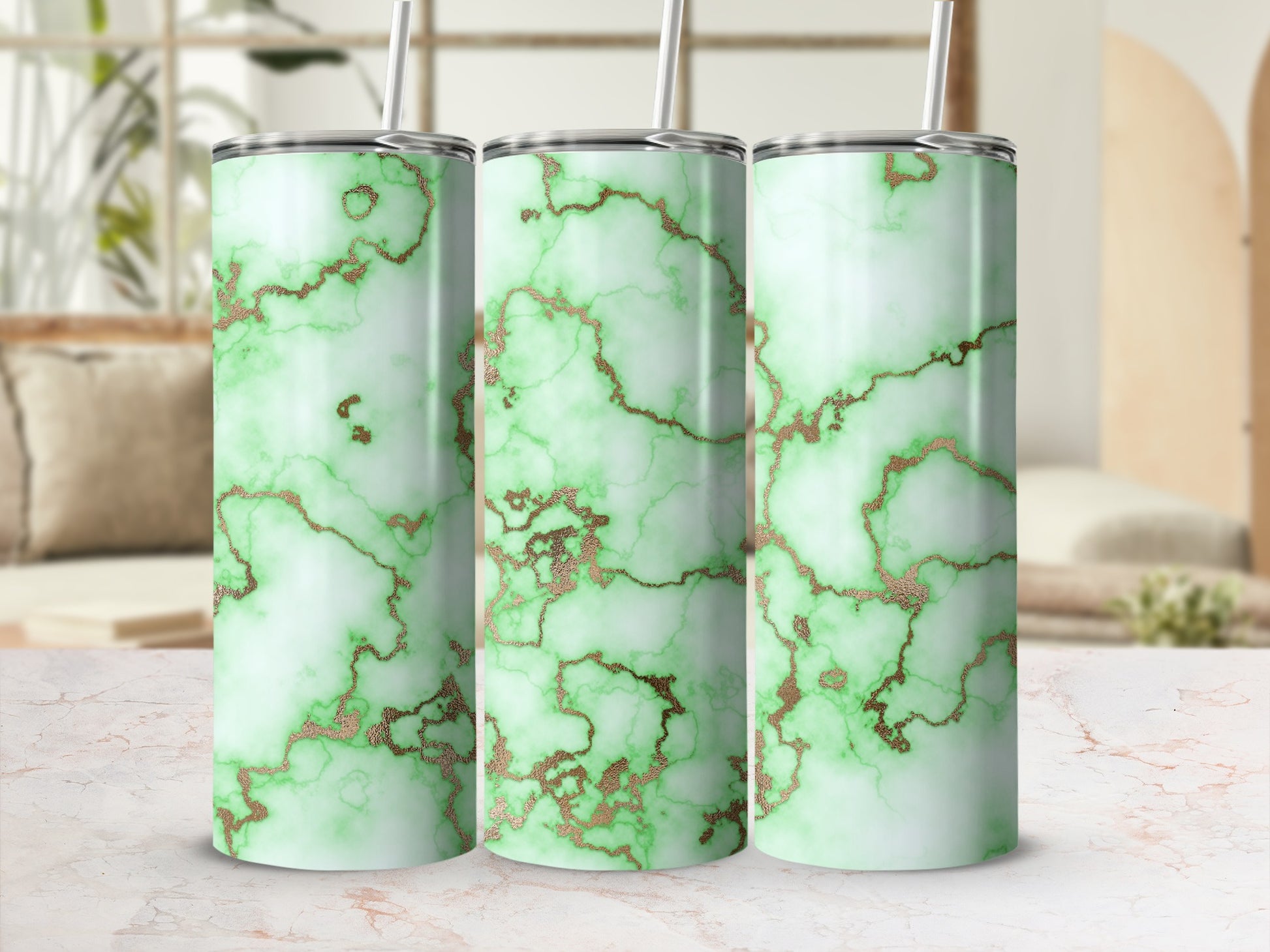 Three tumblers with green marble pattern and gold veins.