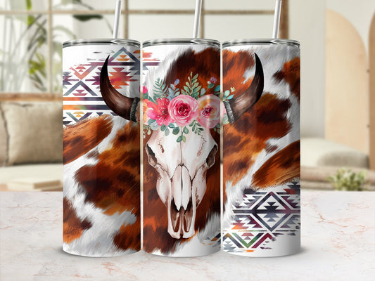 Cow skull with floral crown and Southwestern tribal patterns on tumblers.