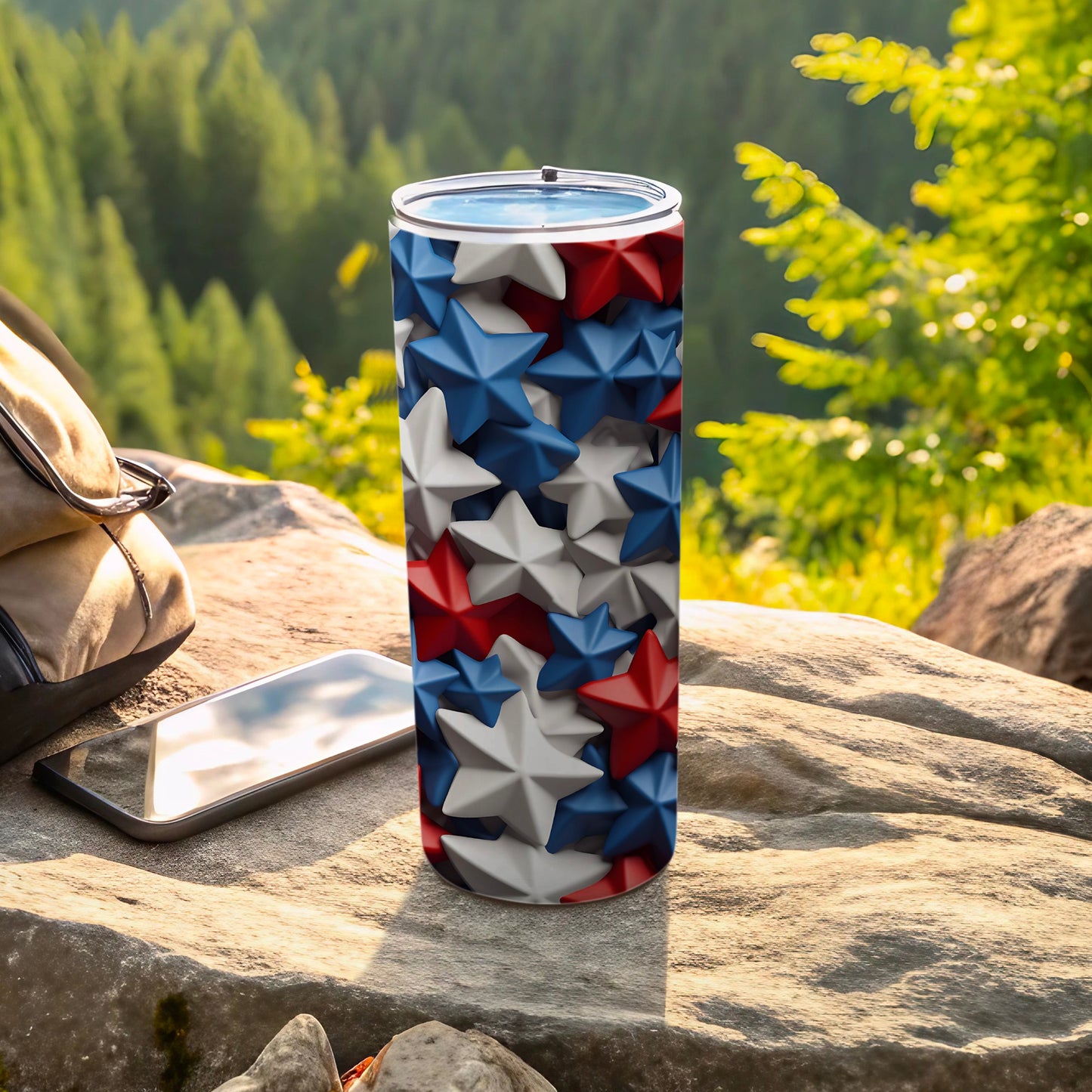 Tumbler with red, white, and blue stars pattern, outdoors.