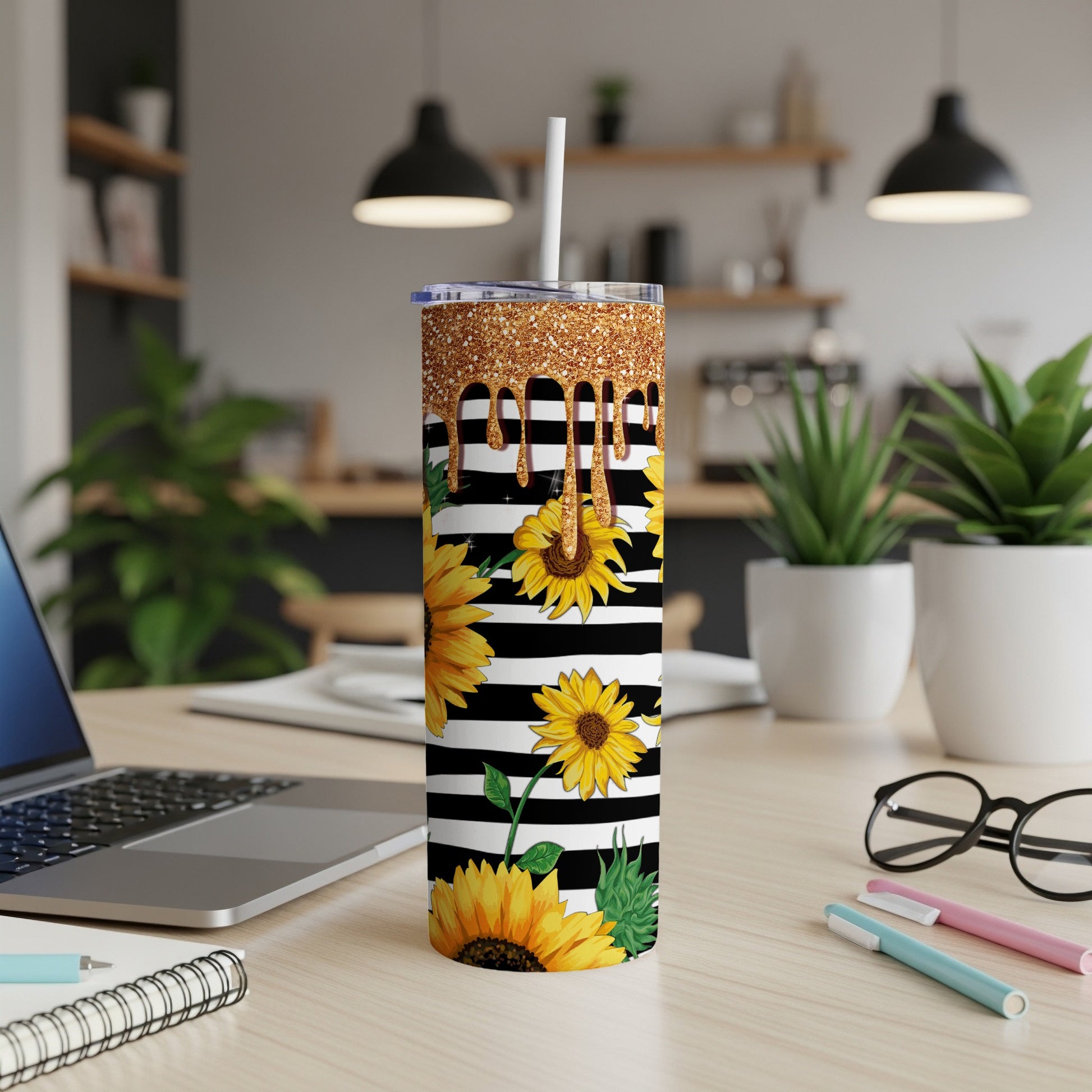 Black and white striped tumbler with sunflowers and glitter gold drip.