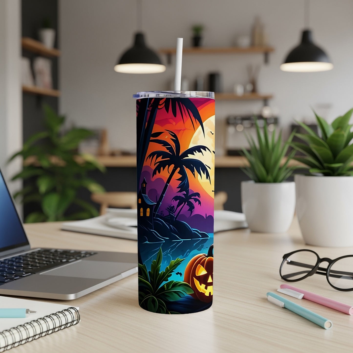 Tumbler with Halloween tropical scene, featuring palm trees, a jack-o'-lantern, and a haunted house.
