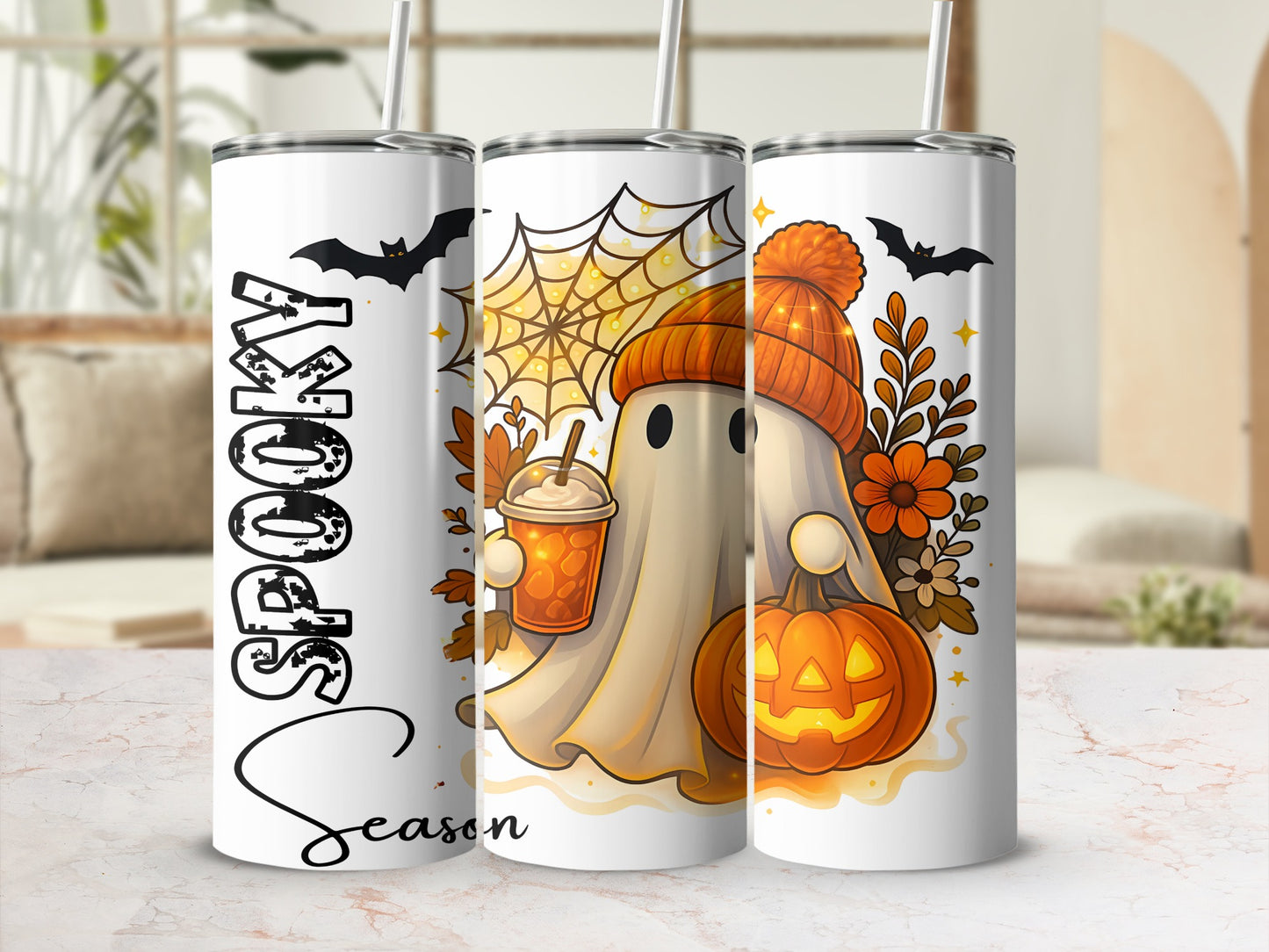 Three tumblers with a Halloween ghost, pumpkin, and autumn leaves design.
