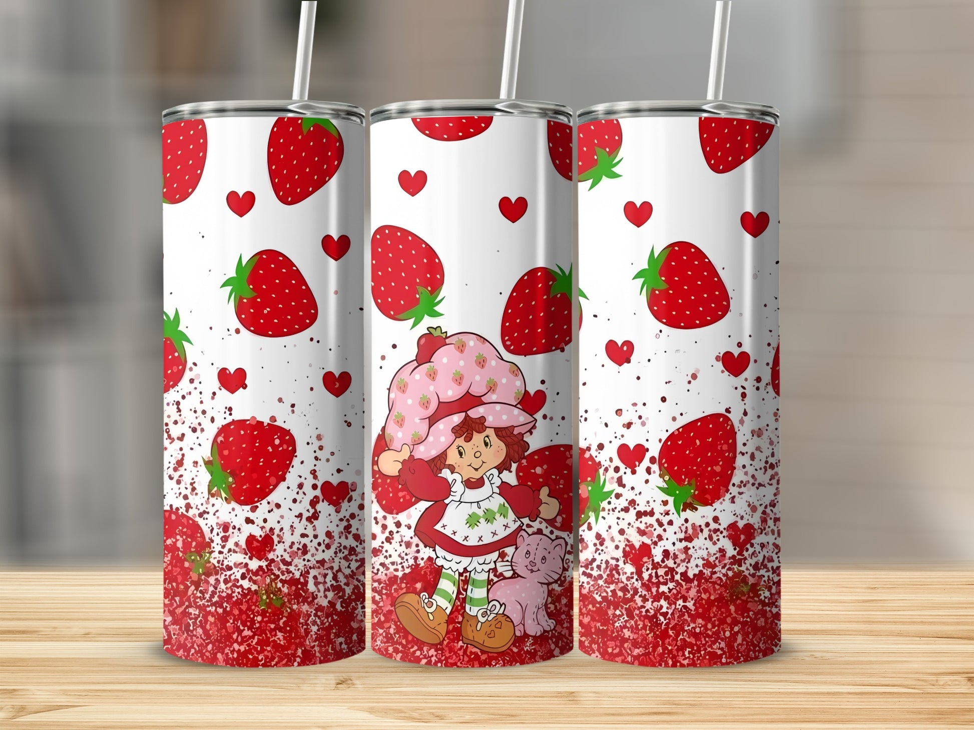 Three strawberry-themed tumblers with a cartoon girl and pink cat design.