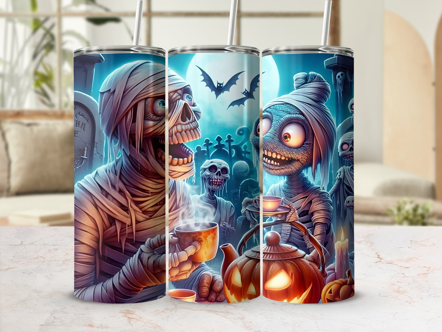 Halloween tumblers featuring mummies, skeletons, bats, and jack-o'-lanterns.