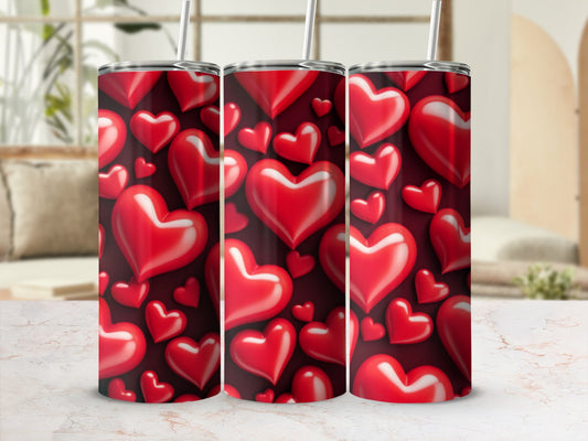 Three stainless steel tumblers with a seamless pattern of red hearts.