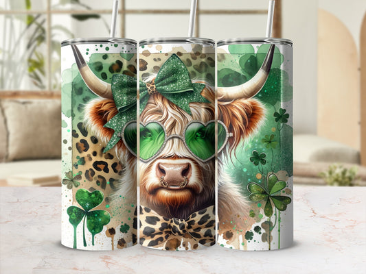 Highland cow wearing heart sunglasses and a green bow, on a tumbler.