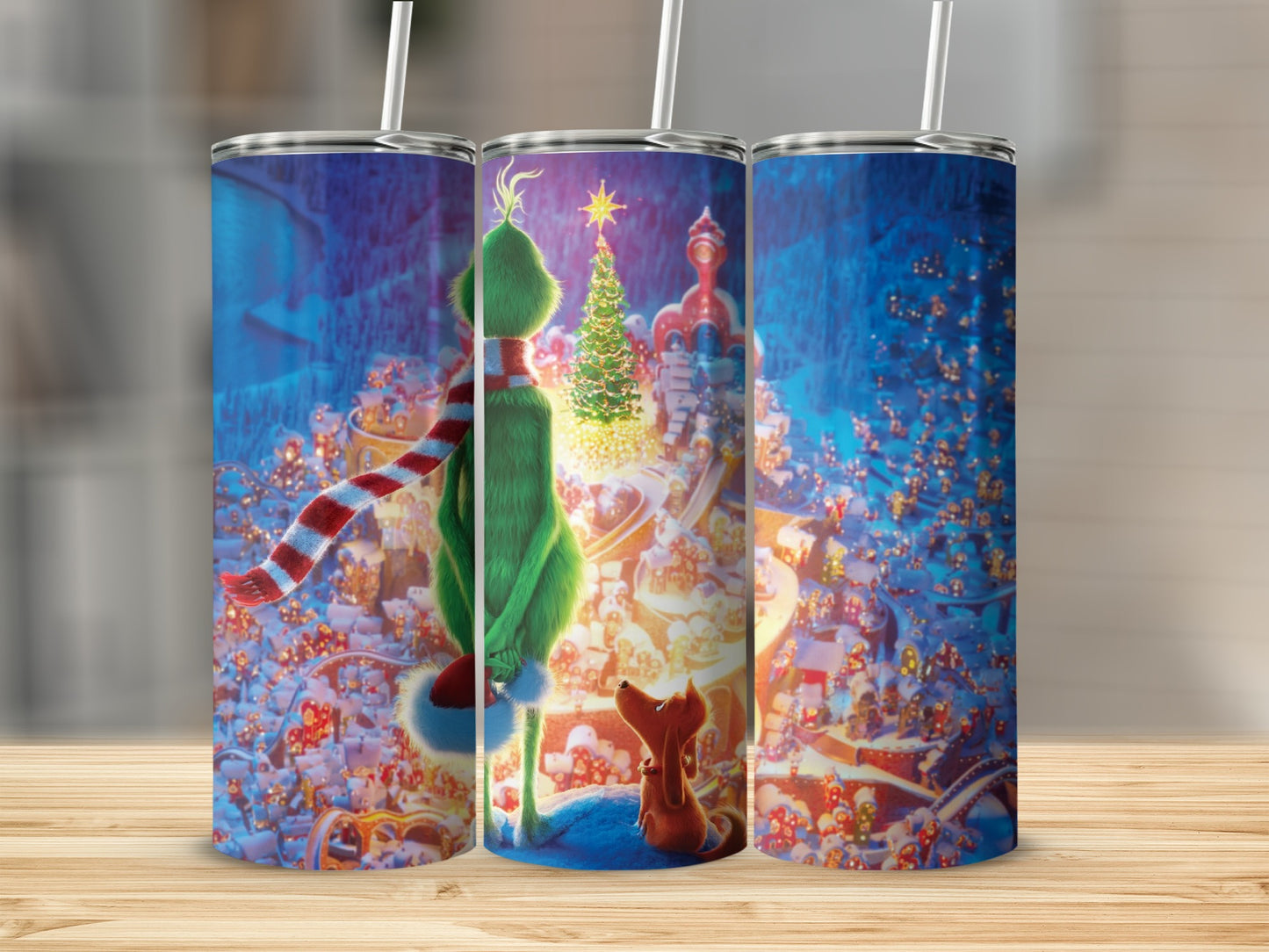 The Grinch and Max in Whoville on a Christmas tumbler.