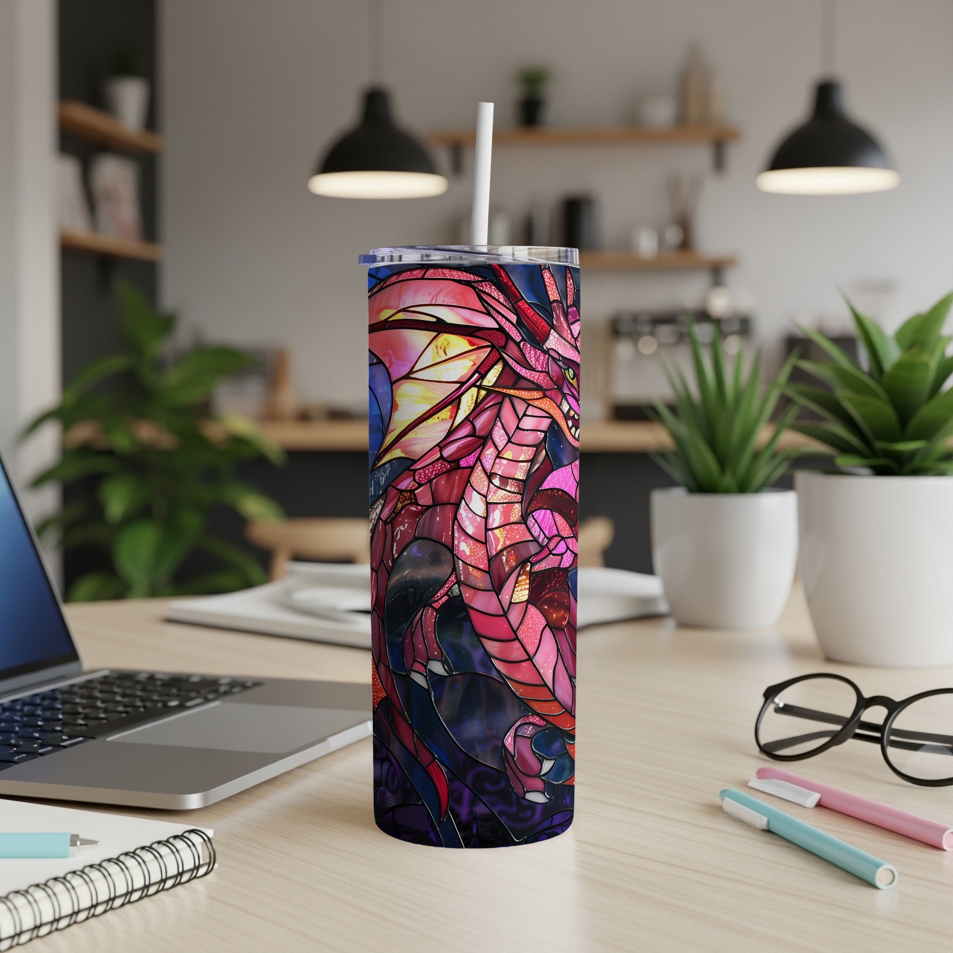 Dragon stained glass design on a stainless steel tumbler with a straw.