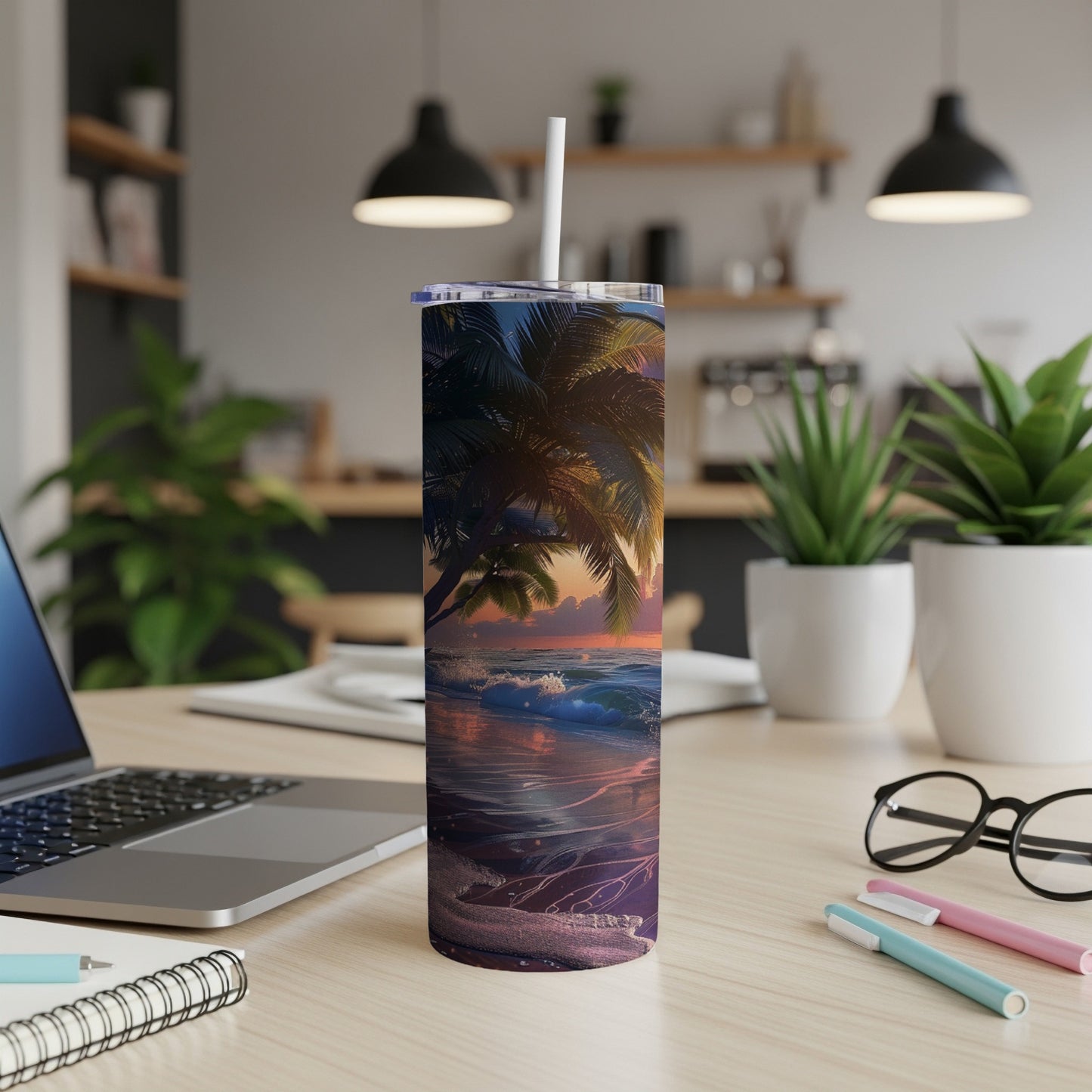Tropical sunset beach scene with palm trees on a travel tumbler.