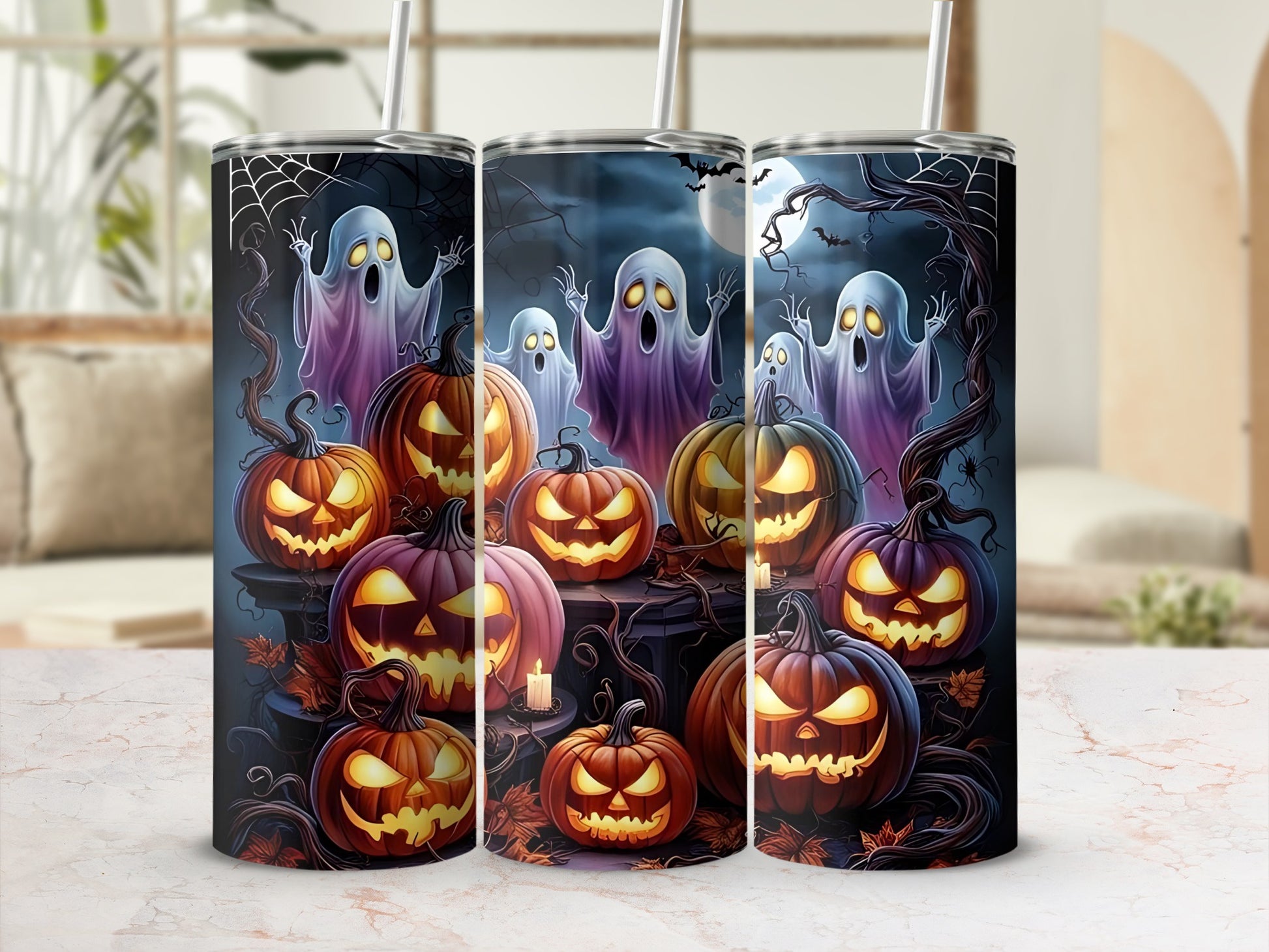 Halloween tumblers with spooky ghosts, jack-o'-lanterns, bats, and spiderwebs.